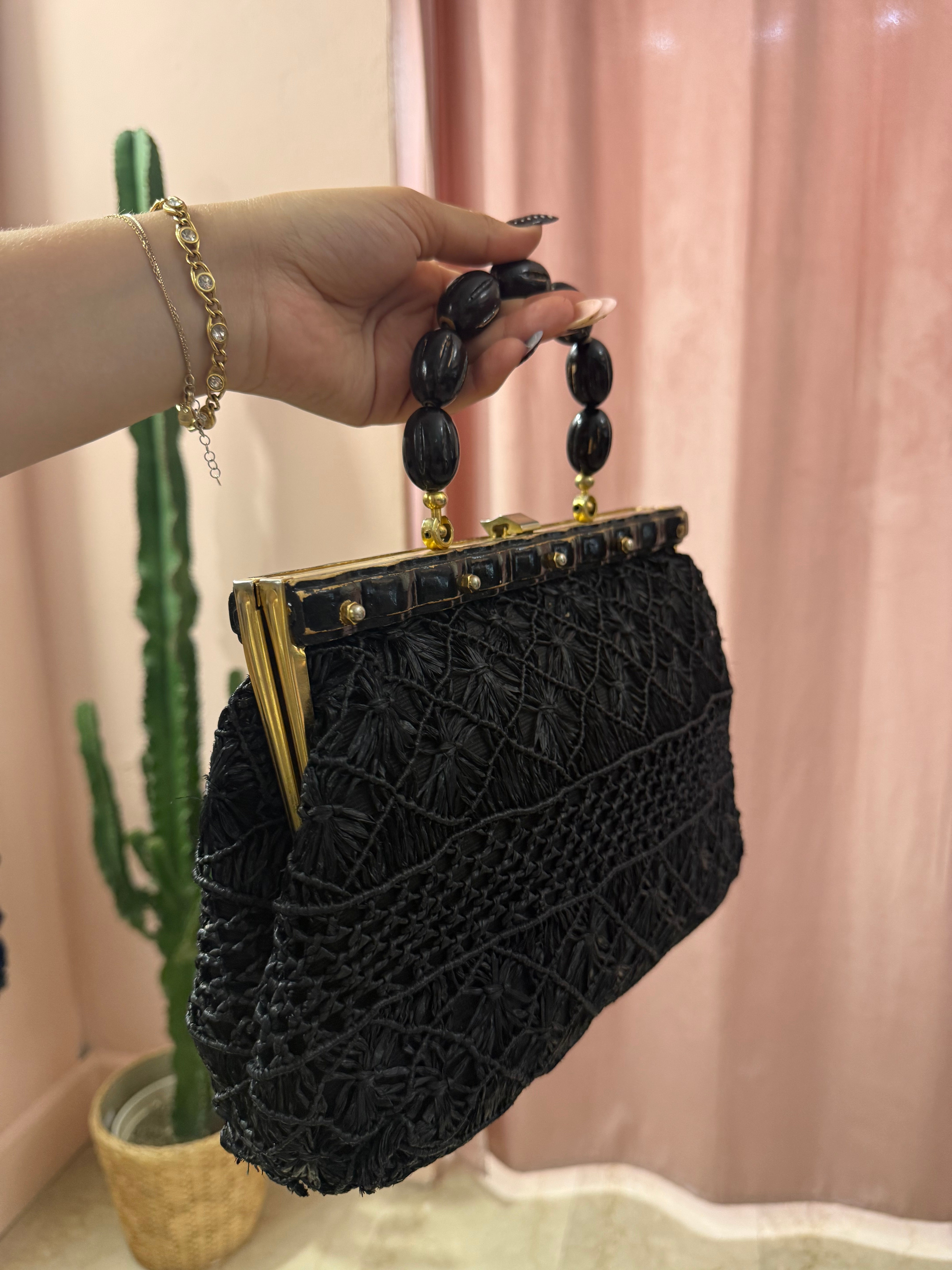 Borsa vintage in paglia con manico in legno