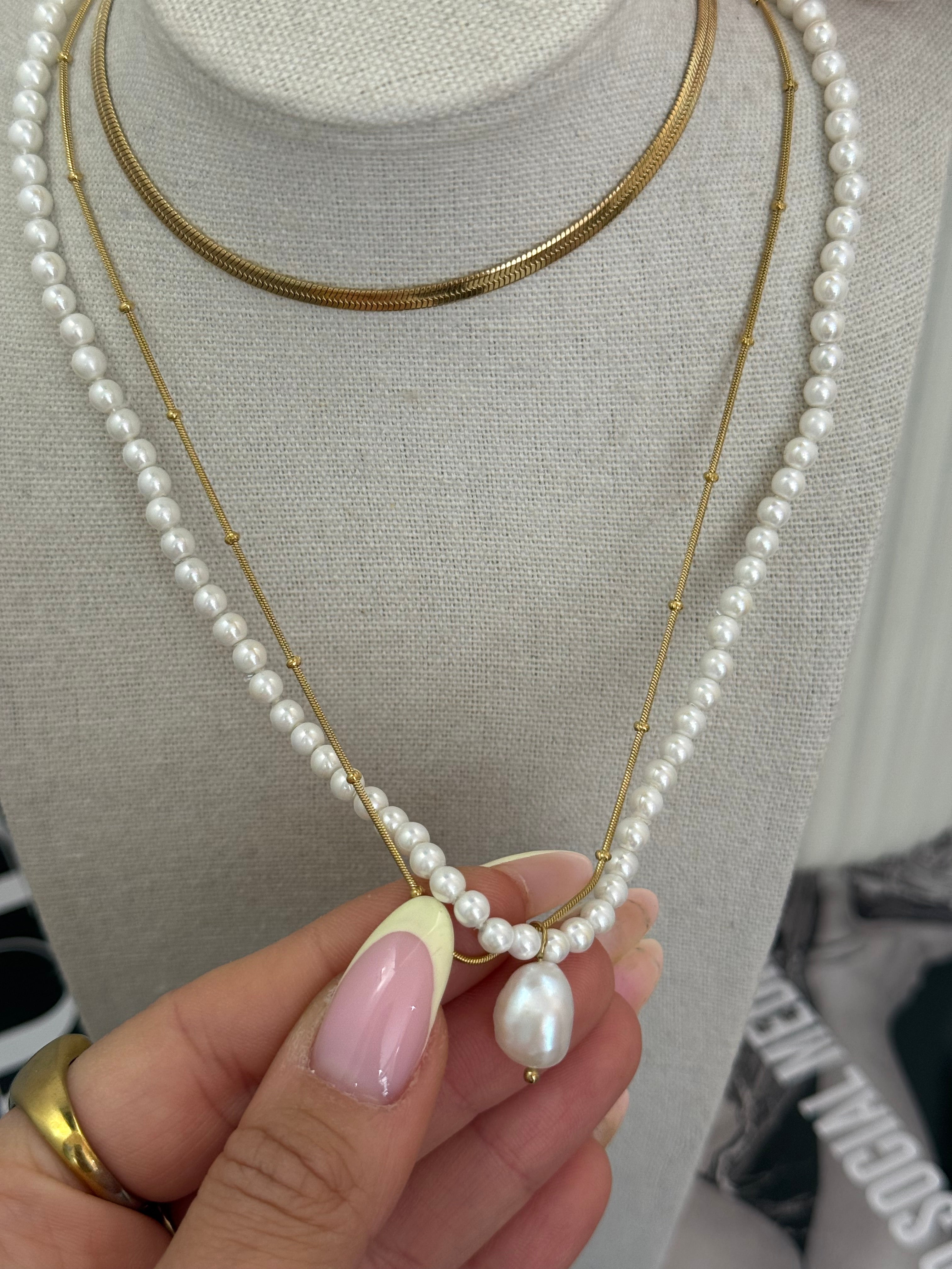 Collana doppia con perla sfaccettata