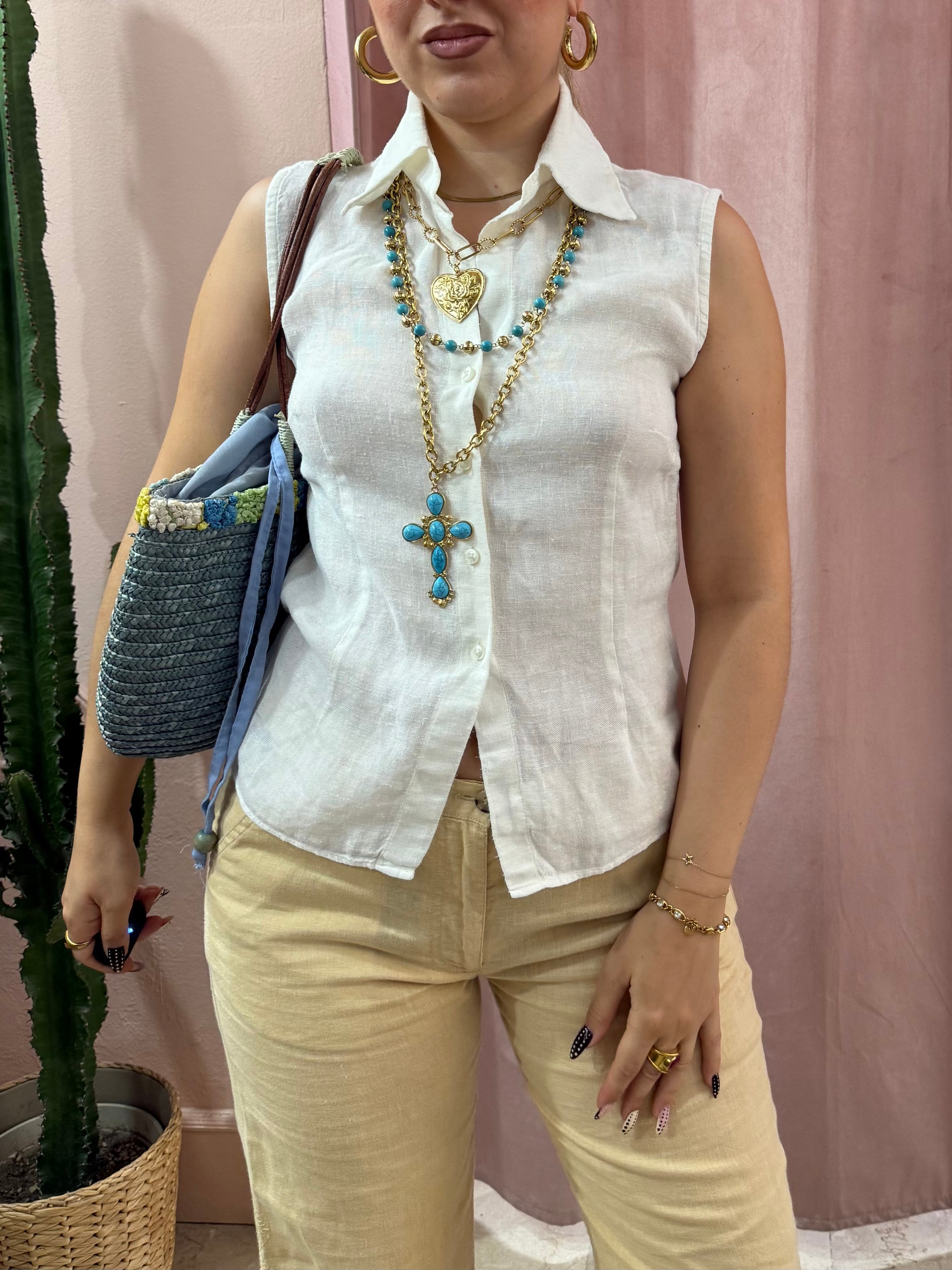 Blusa smanicata bianca in puro lino