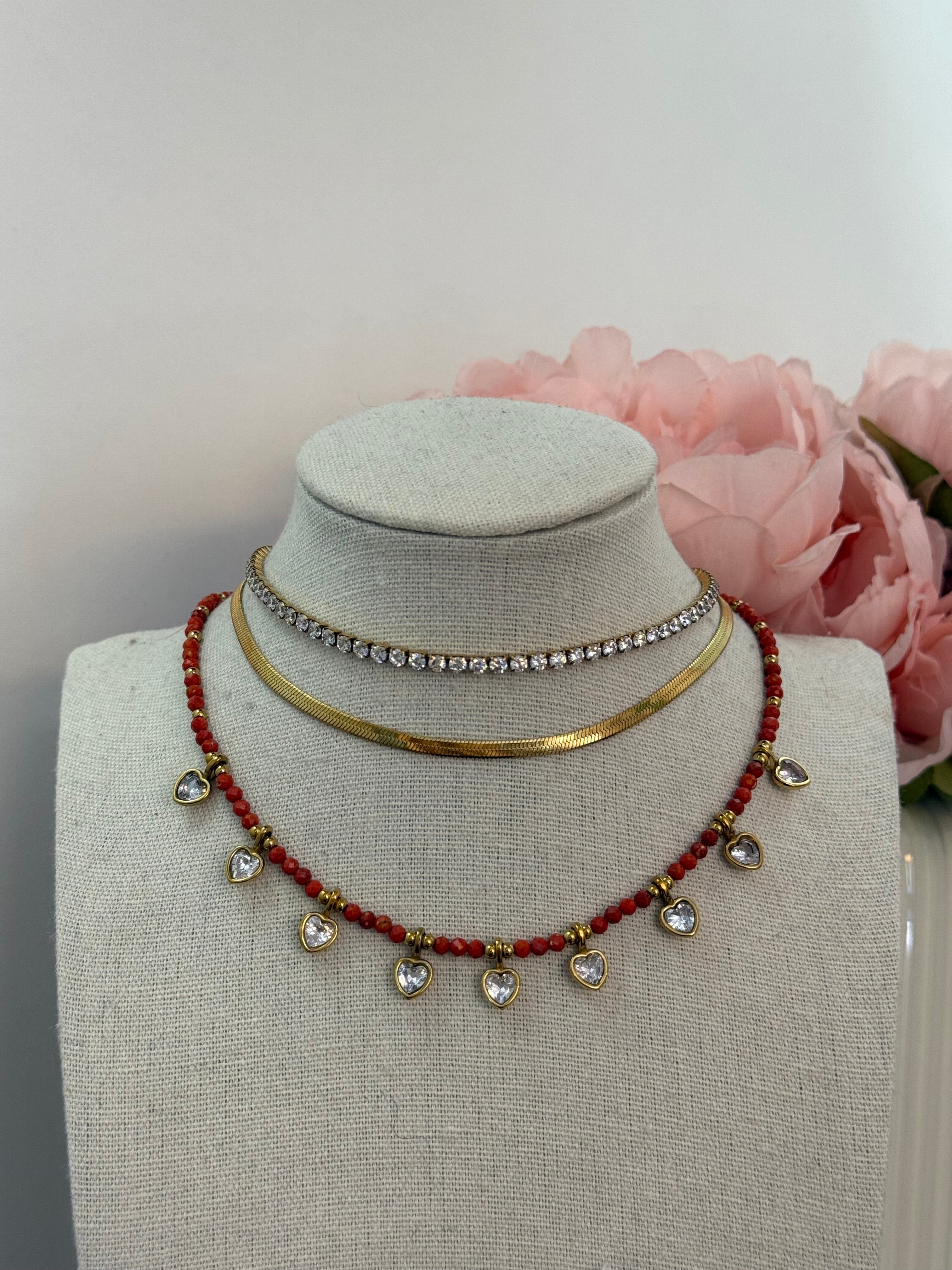Collana girocollo cuoricini punto luce