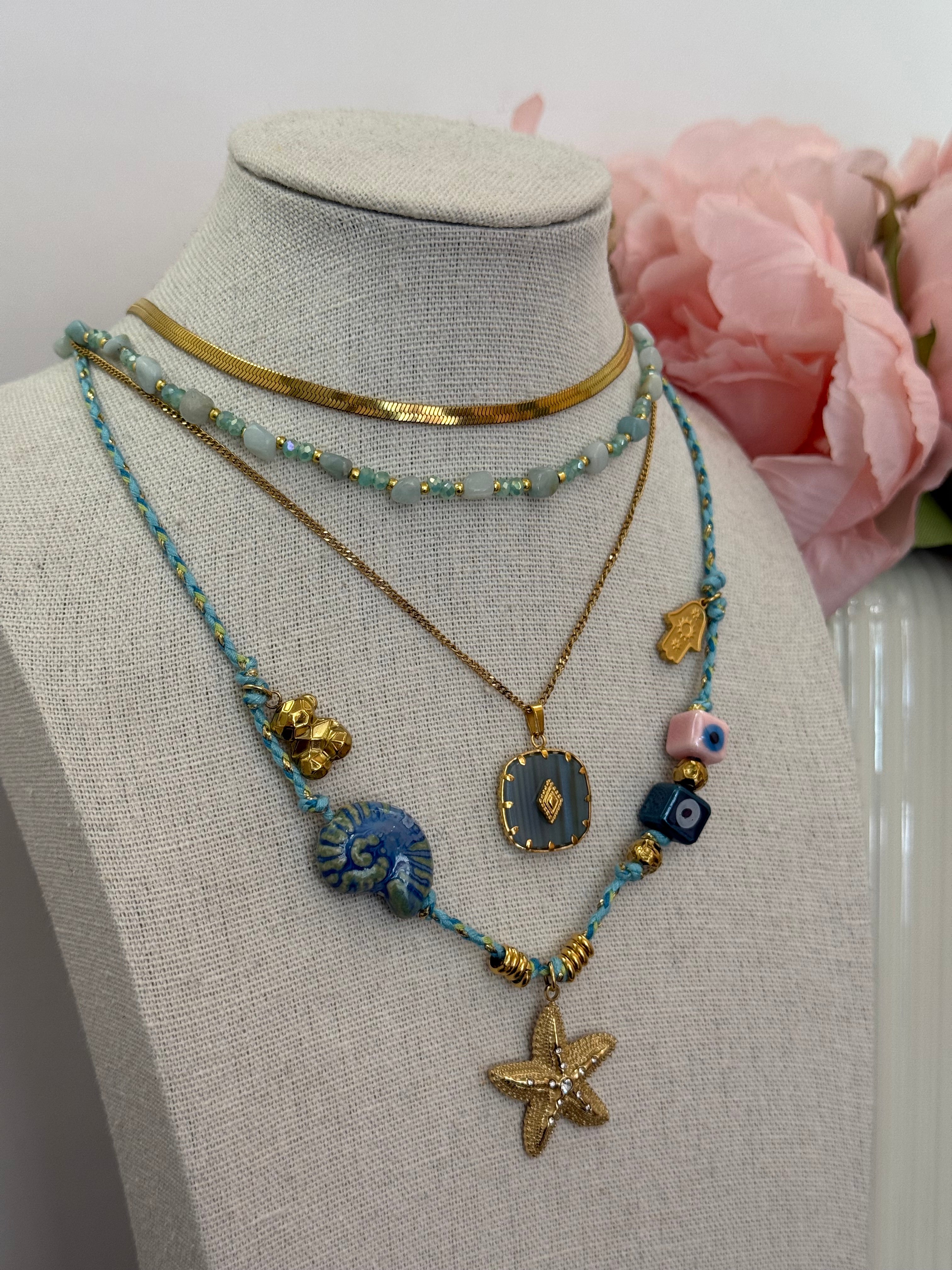 Collana multi charm stella marina corda azzurra