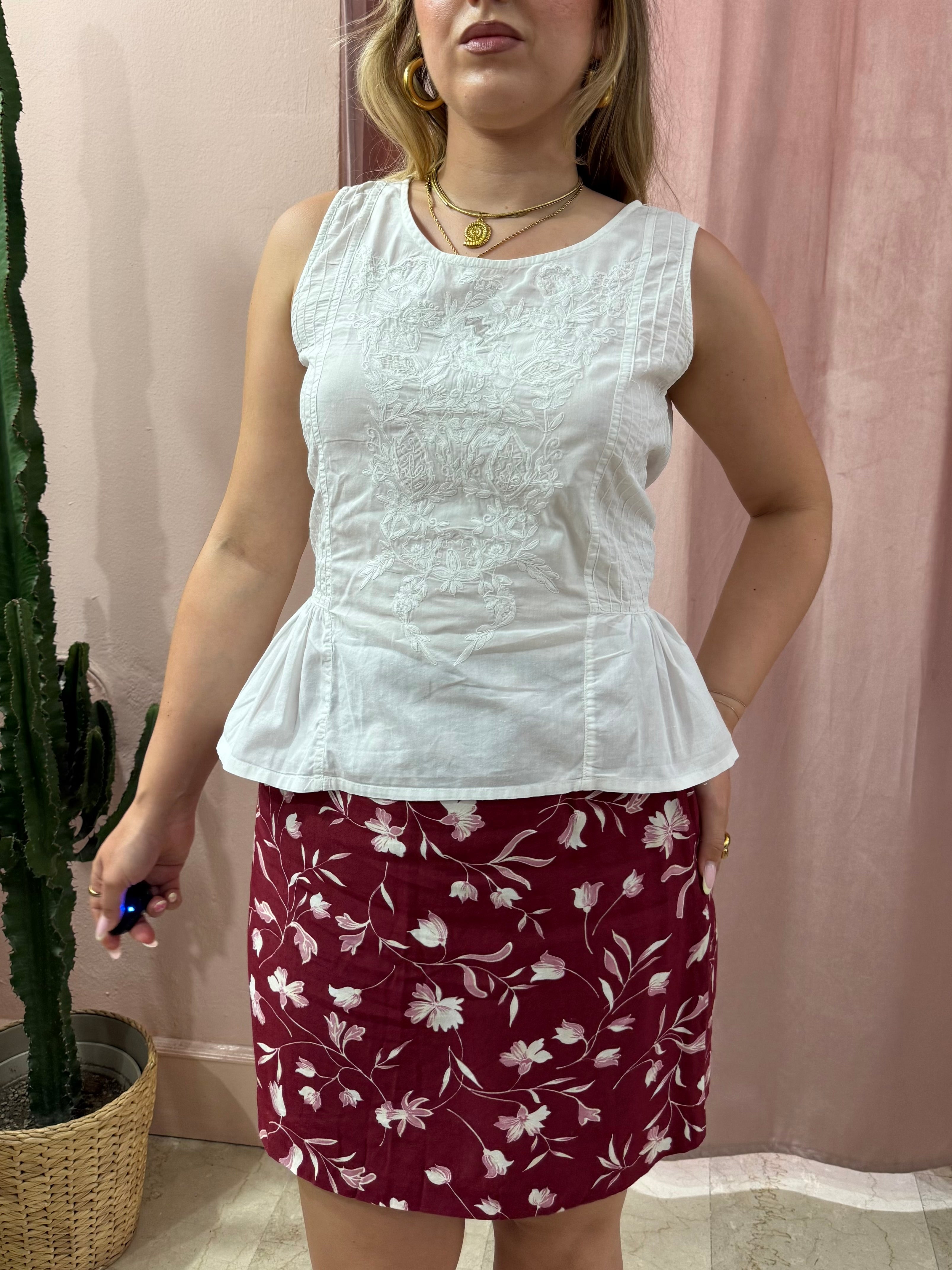 Blusa smanicata bianca in cotone con fiocco