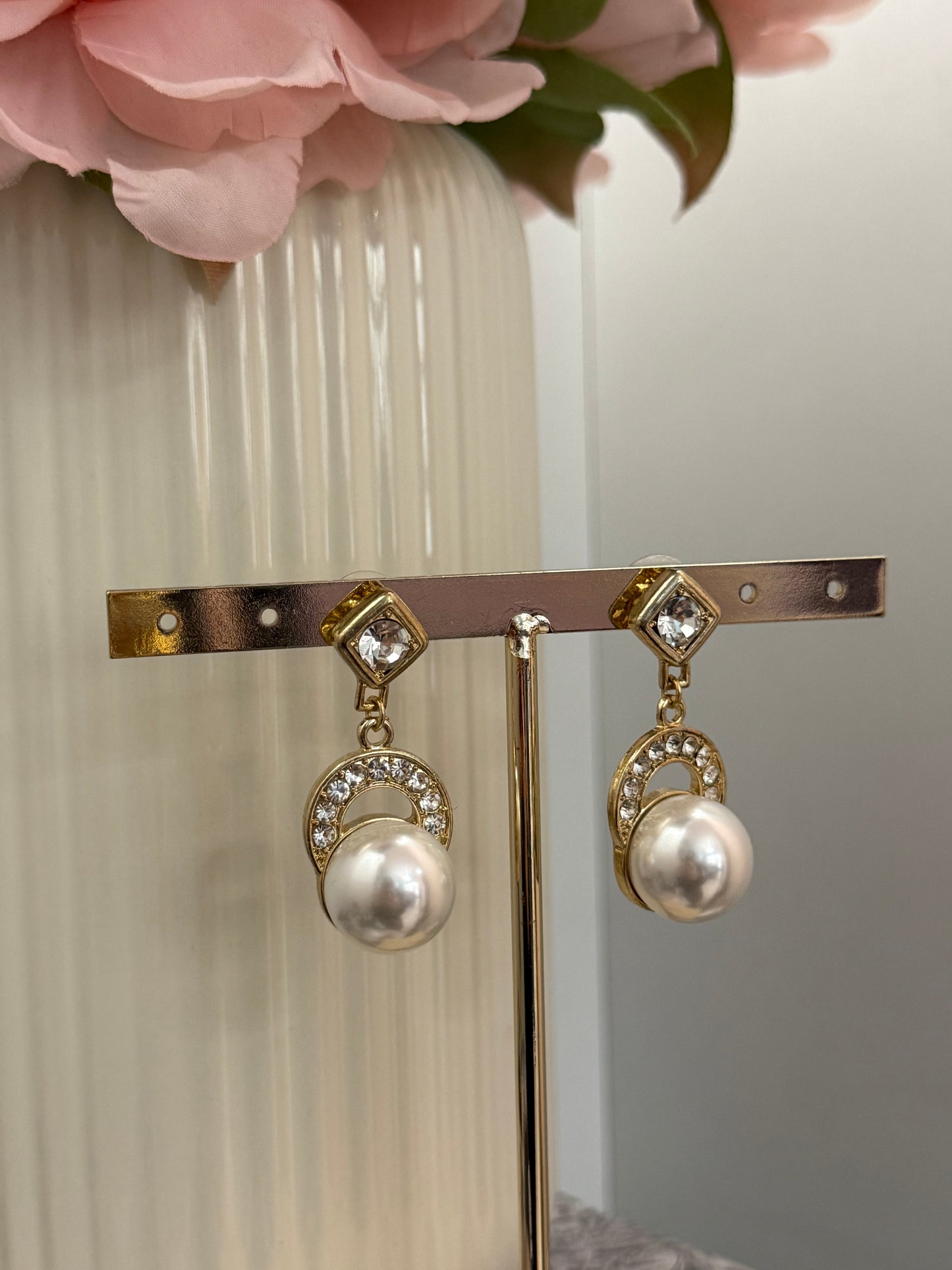 Orecchini pendenti con perle