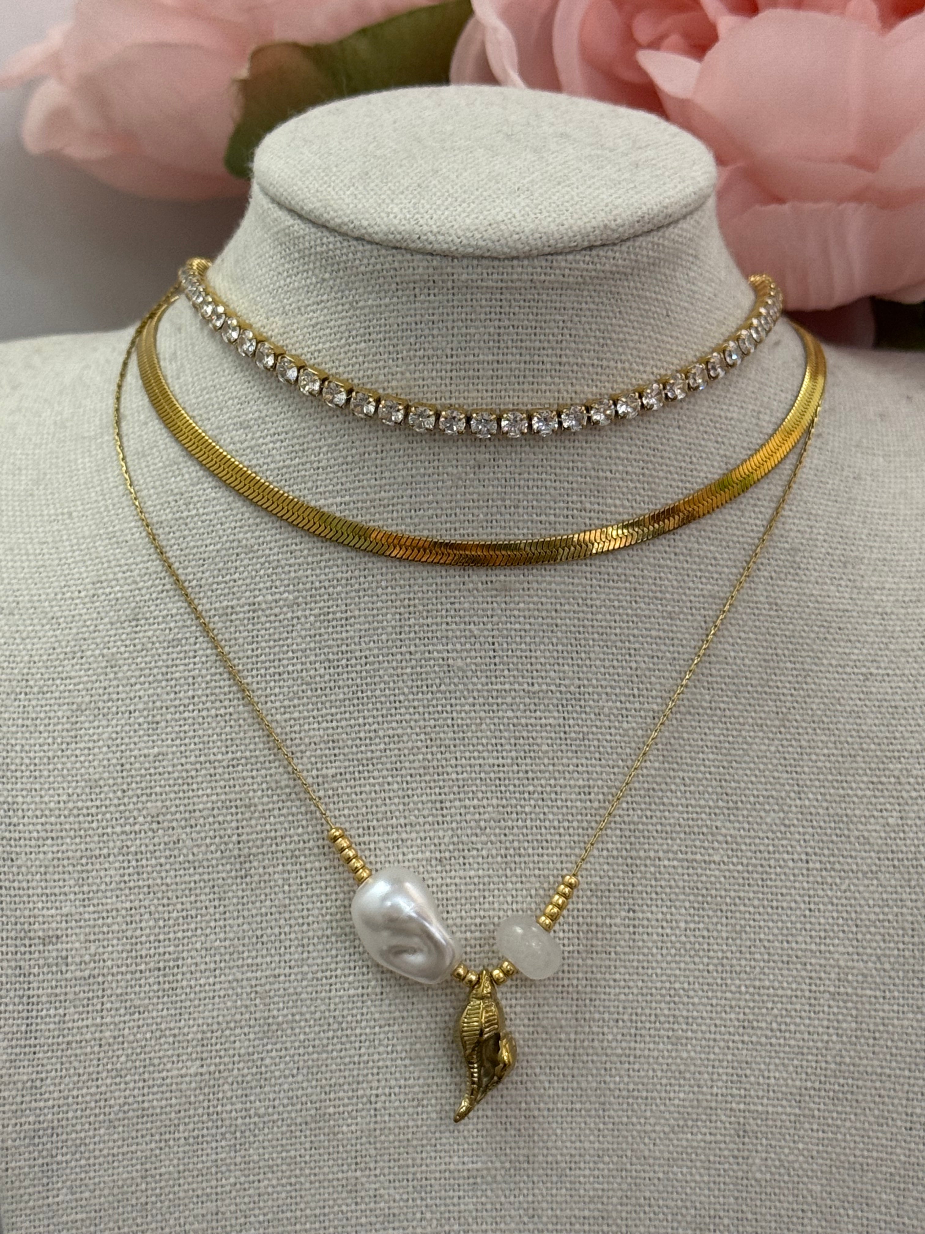 Collana conchiglia con perla di fiume