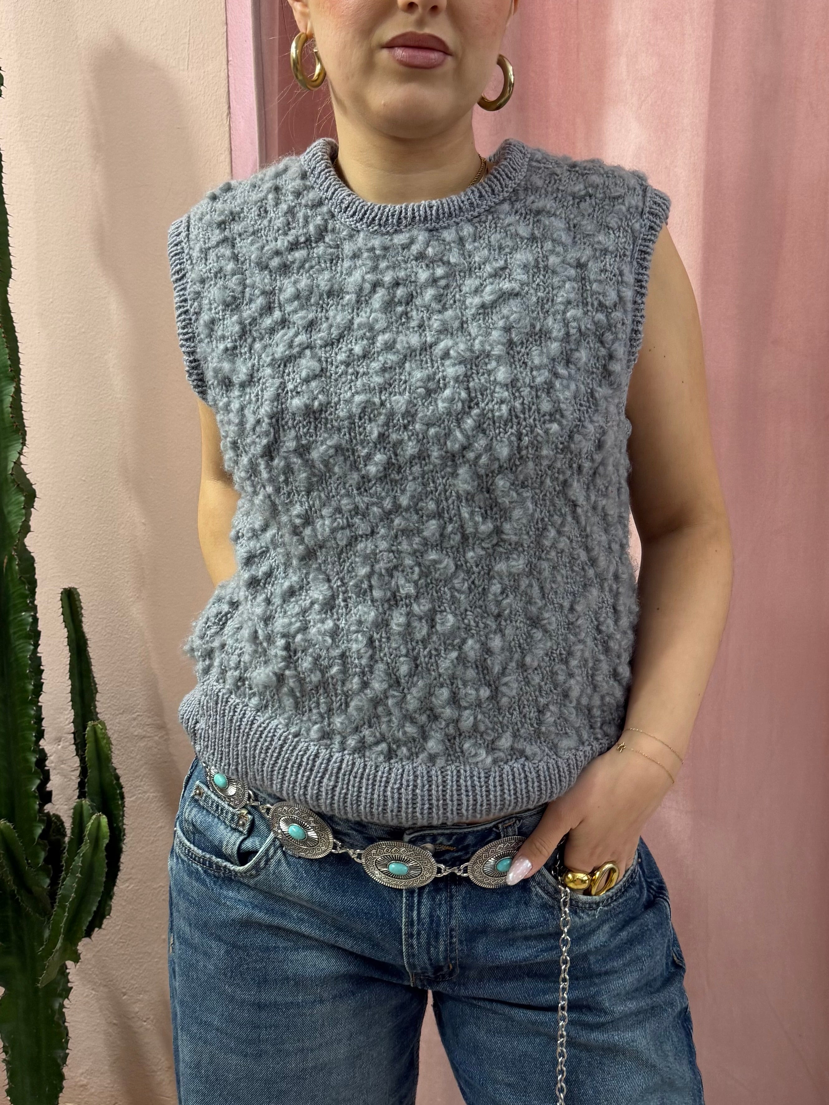 Smanicato in maglia di lana grigio