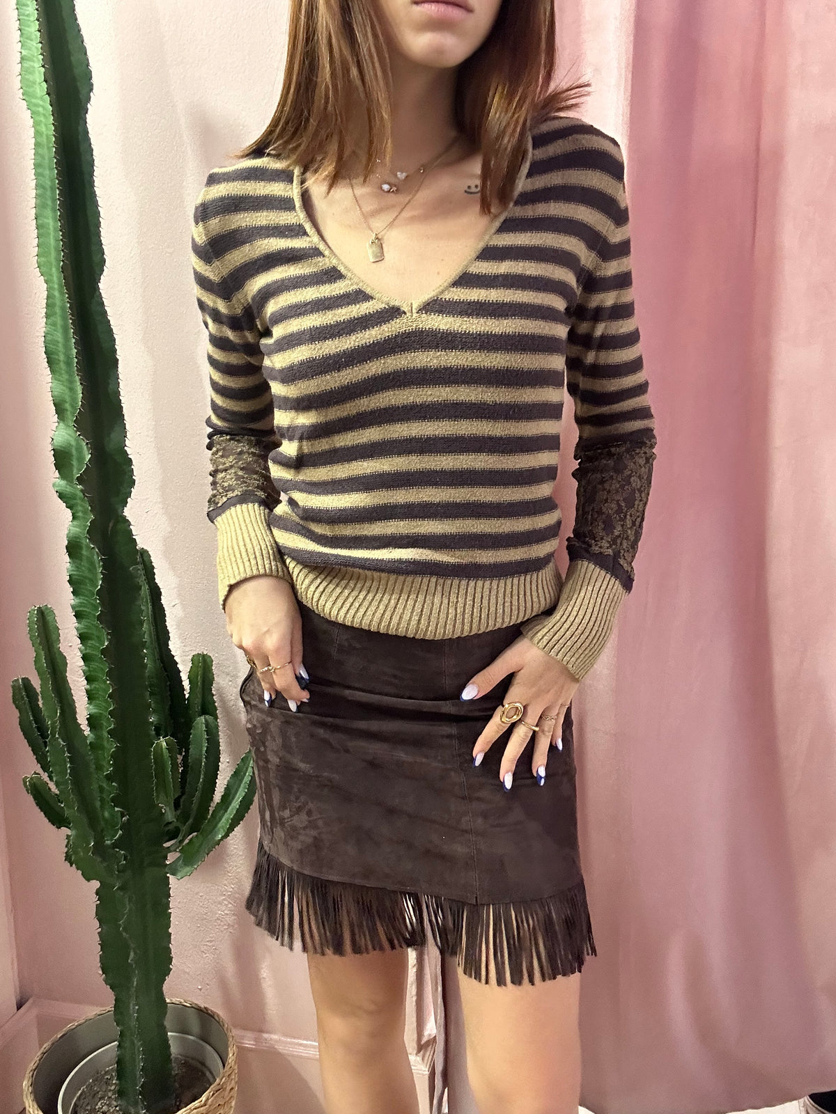 Minigonna con frange in pelle