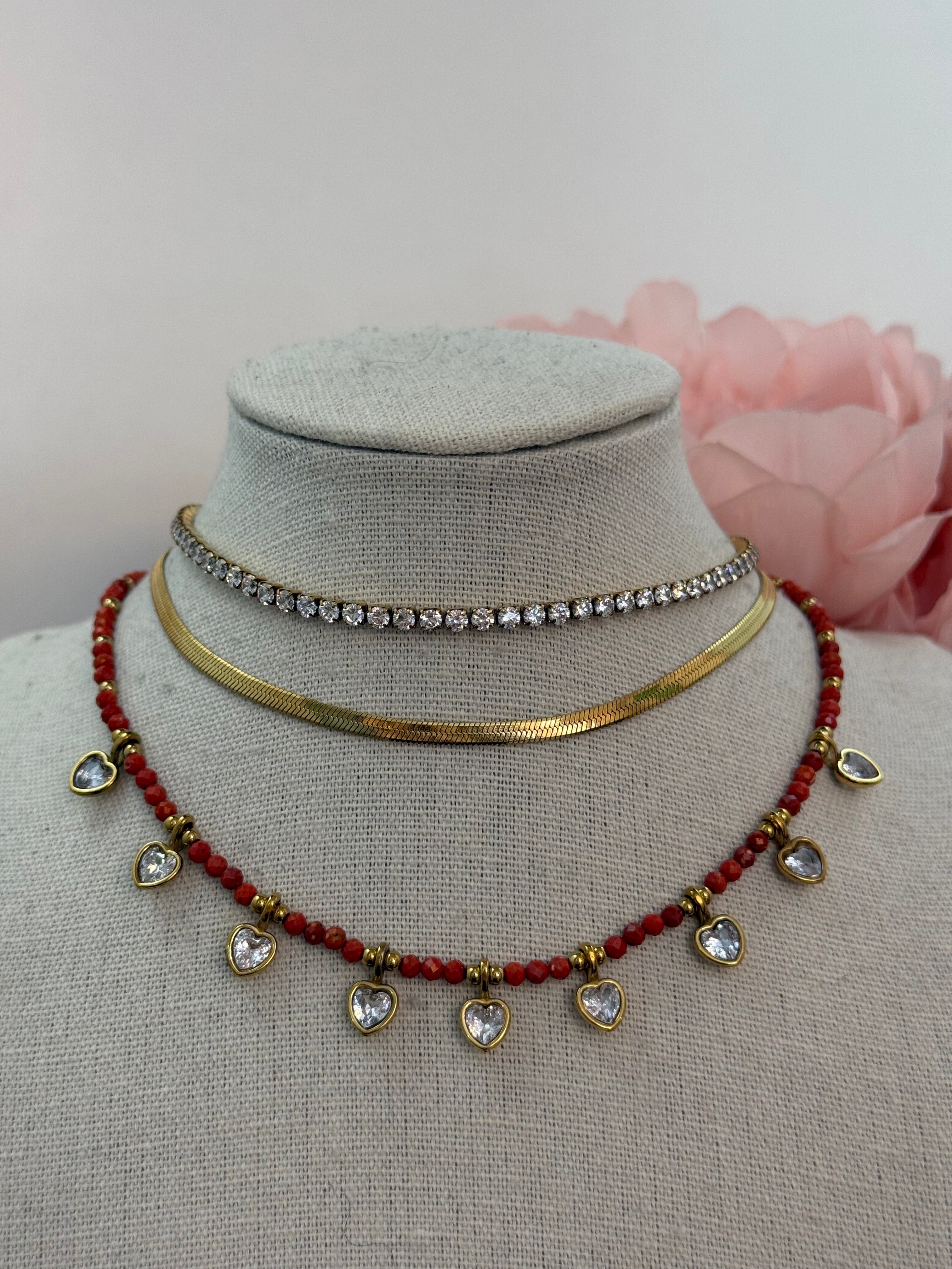 Collana girocollo cuoricini punto luce