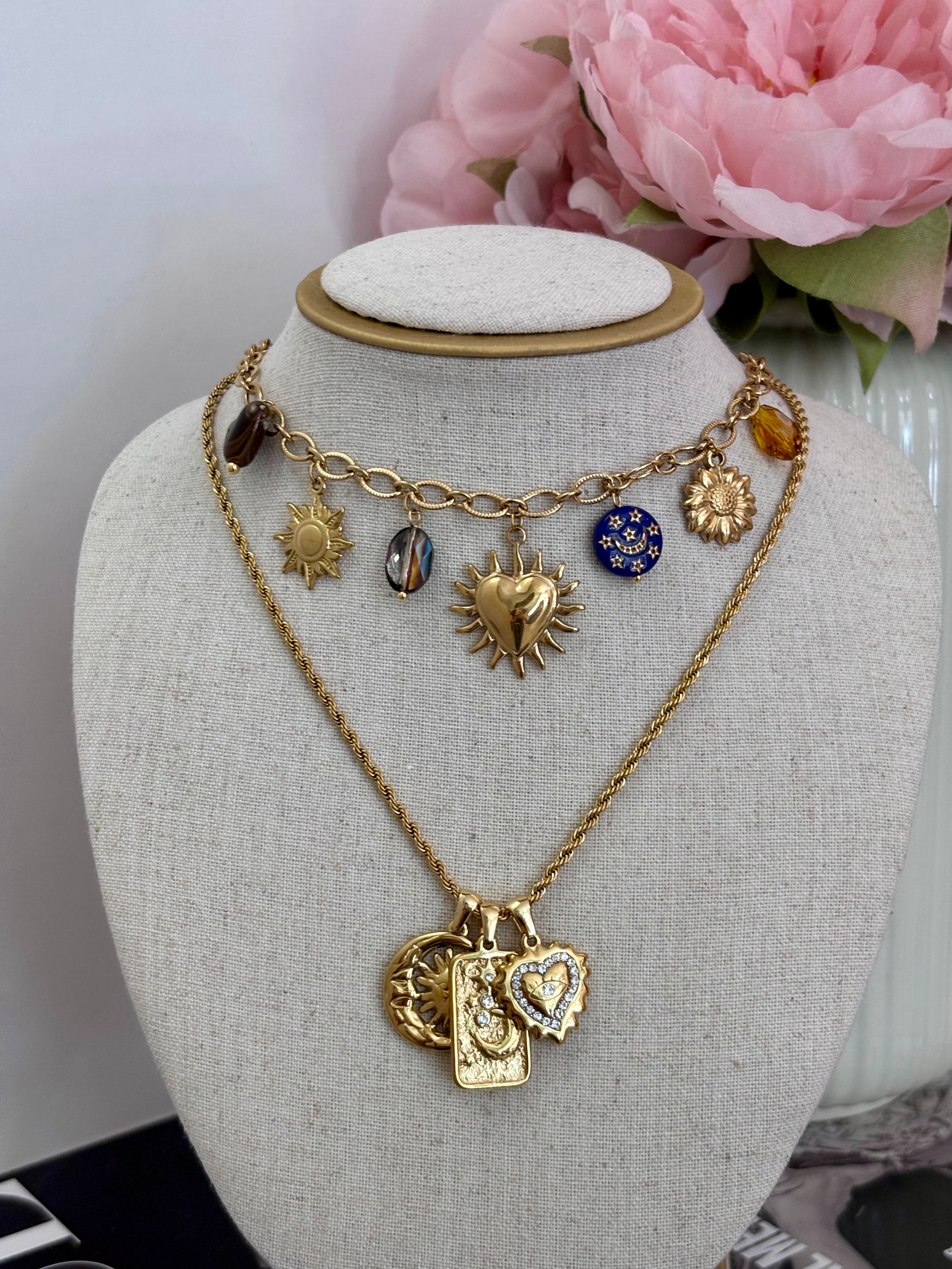 Collana multi charm cuore sacro