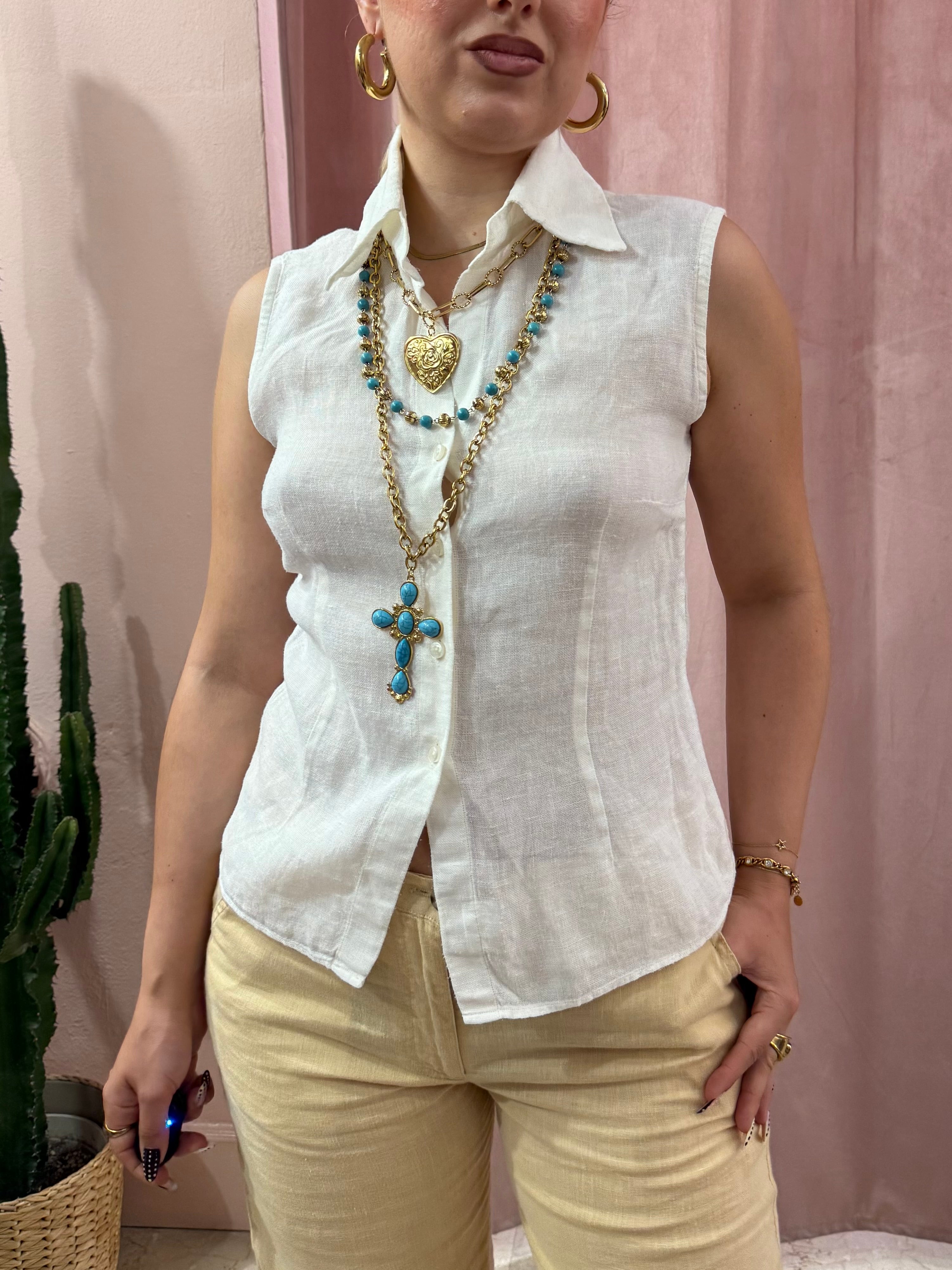 Blusa smanicata bianca in puro lino