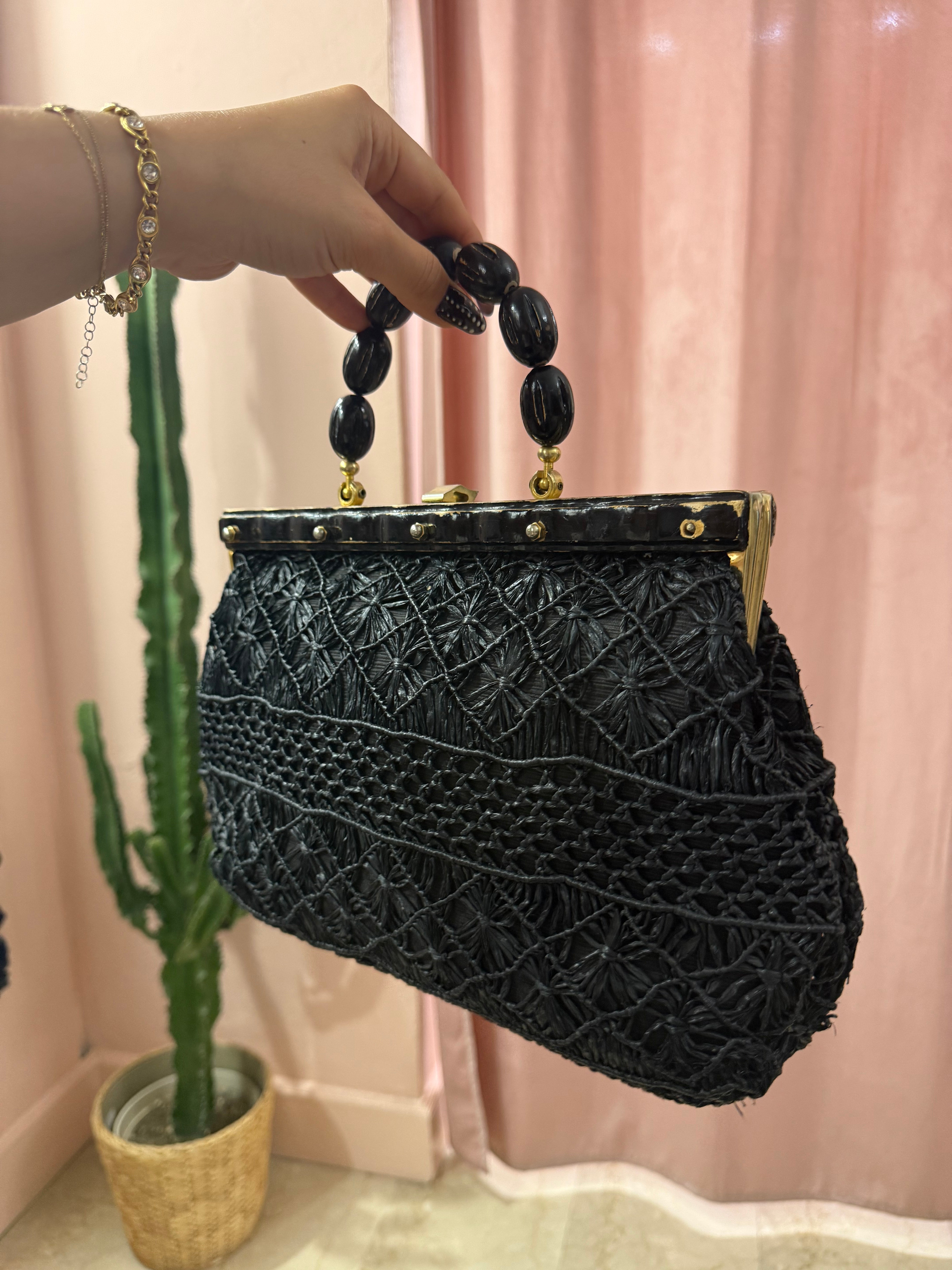 Borsa vintage in paglia con manico in legno