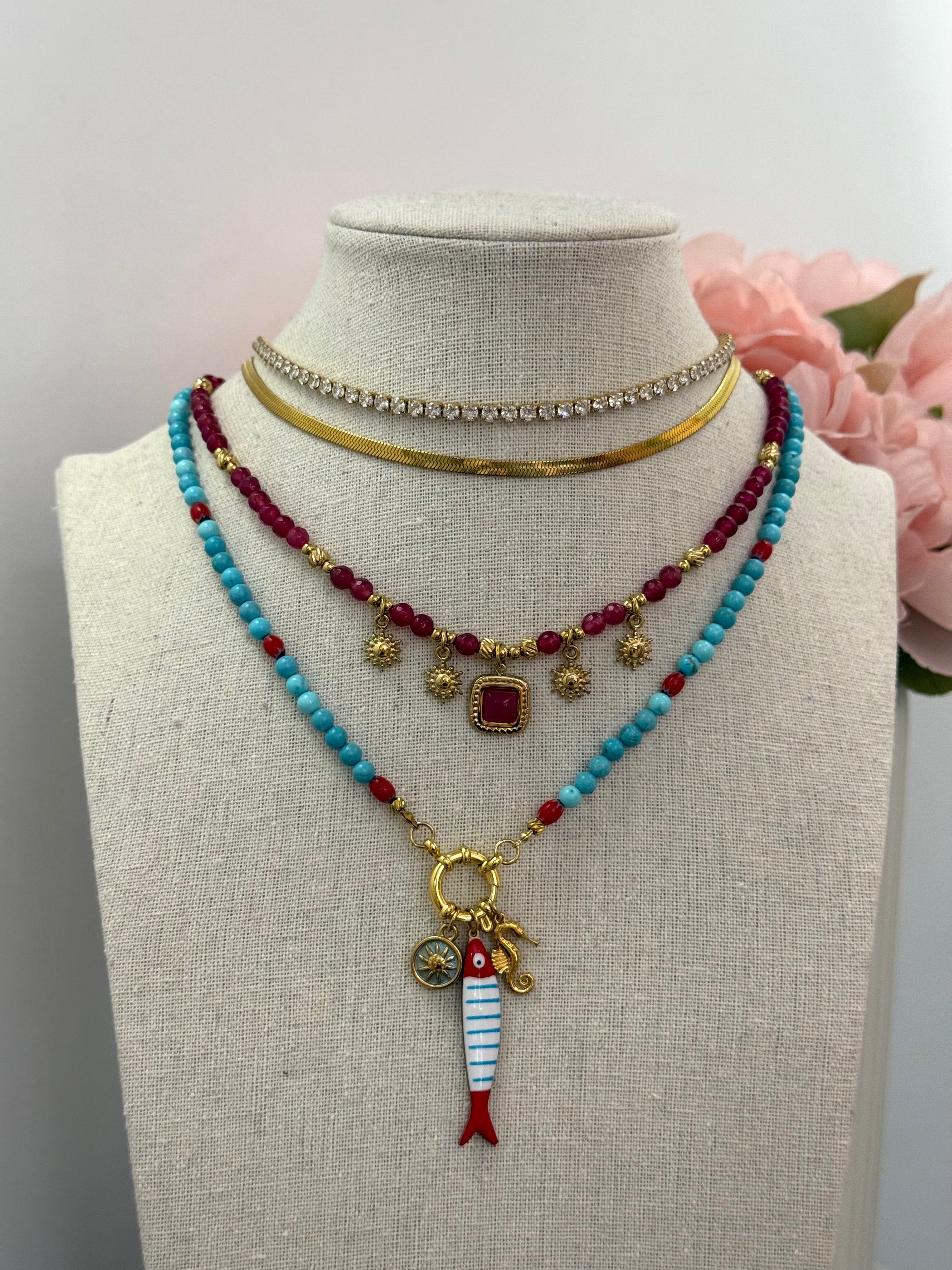 Collana turchese con ciondoli marini