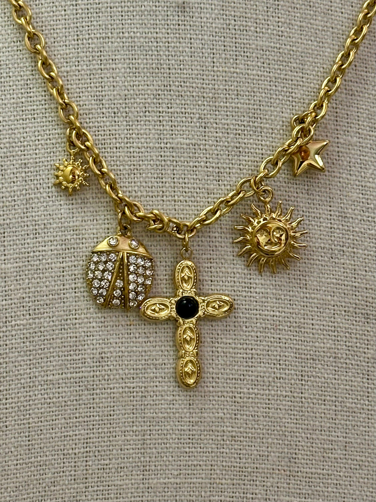 collana multicharm croce