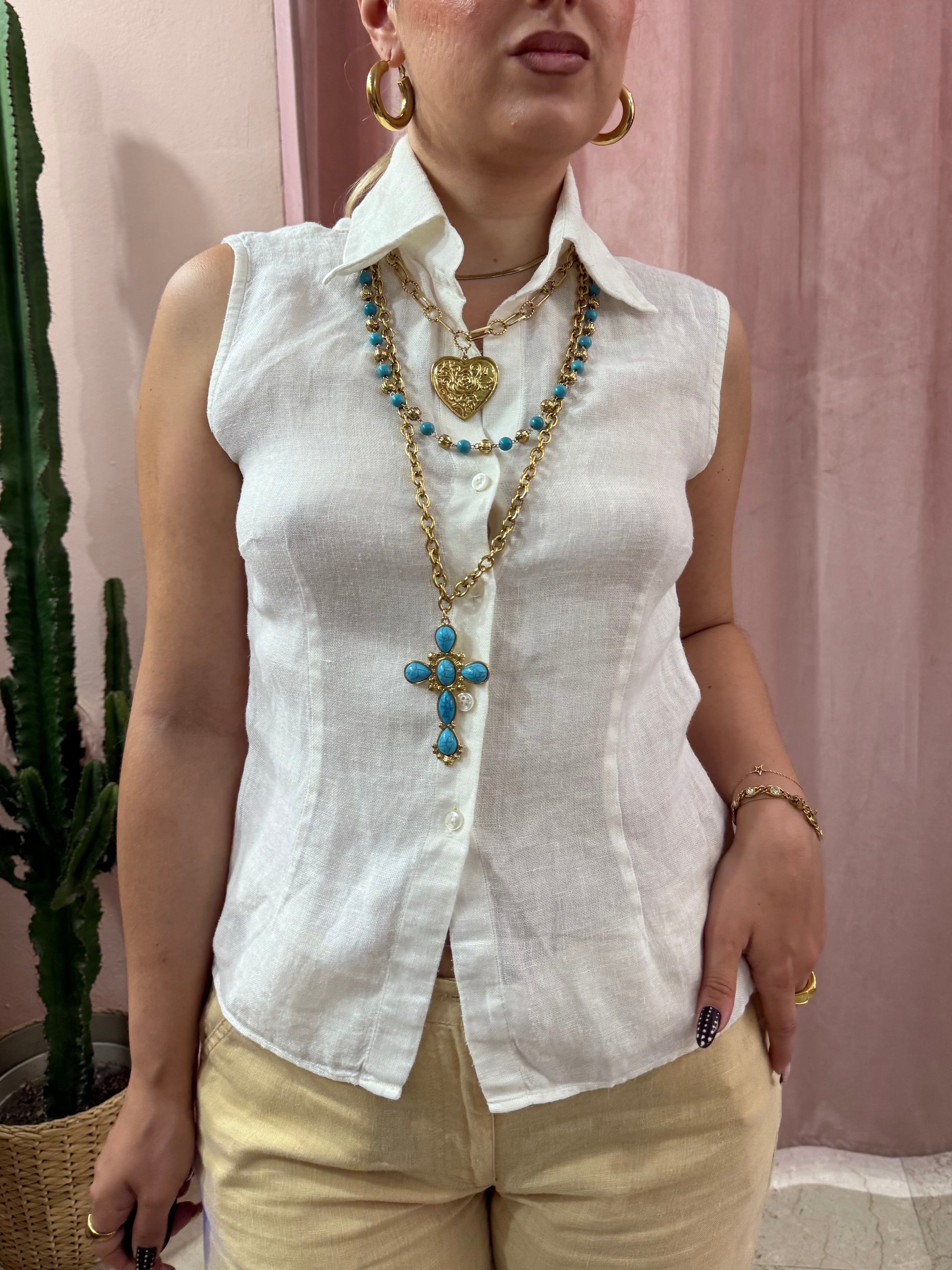 Blusa smanicata bianca in puro lino
