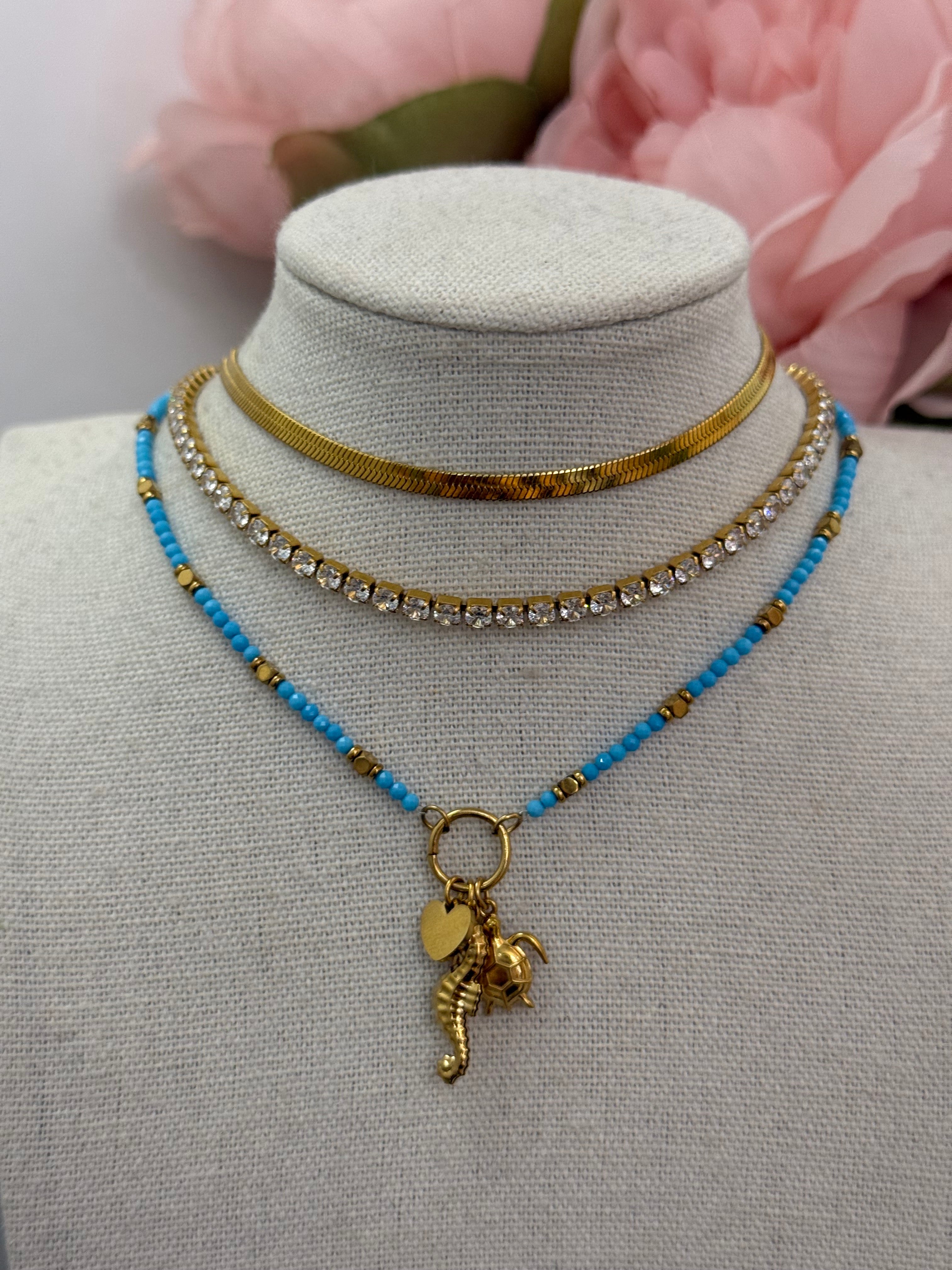 Collana micro perle con ciondoli