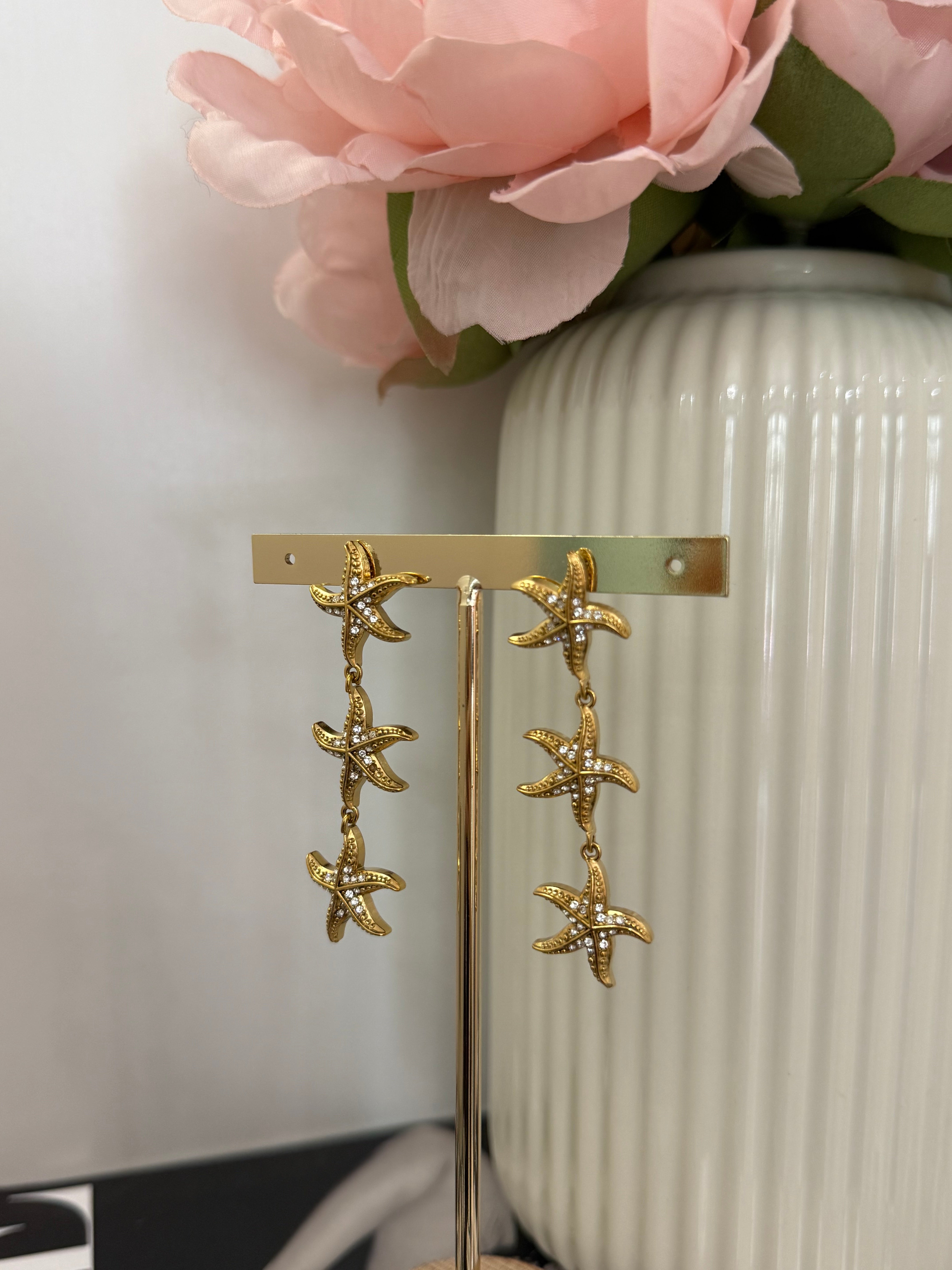 Orecchini pendenti stella marina con strass