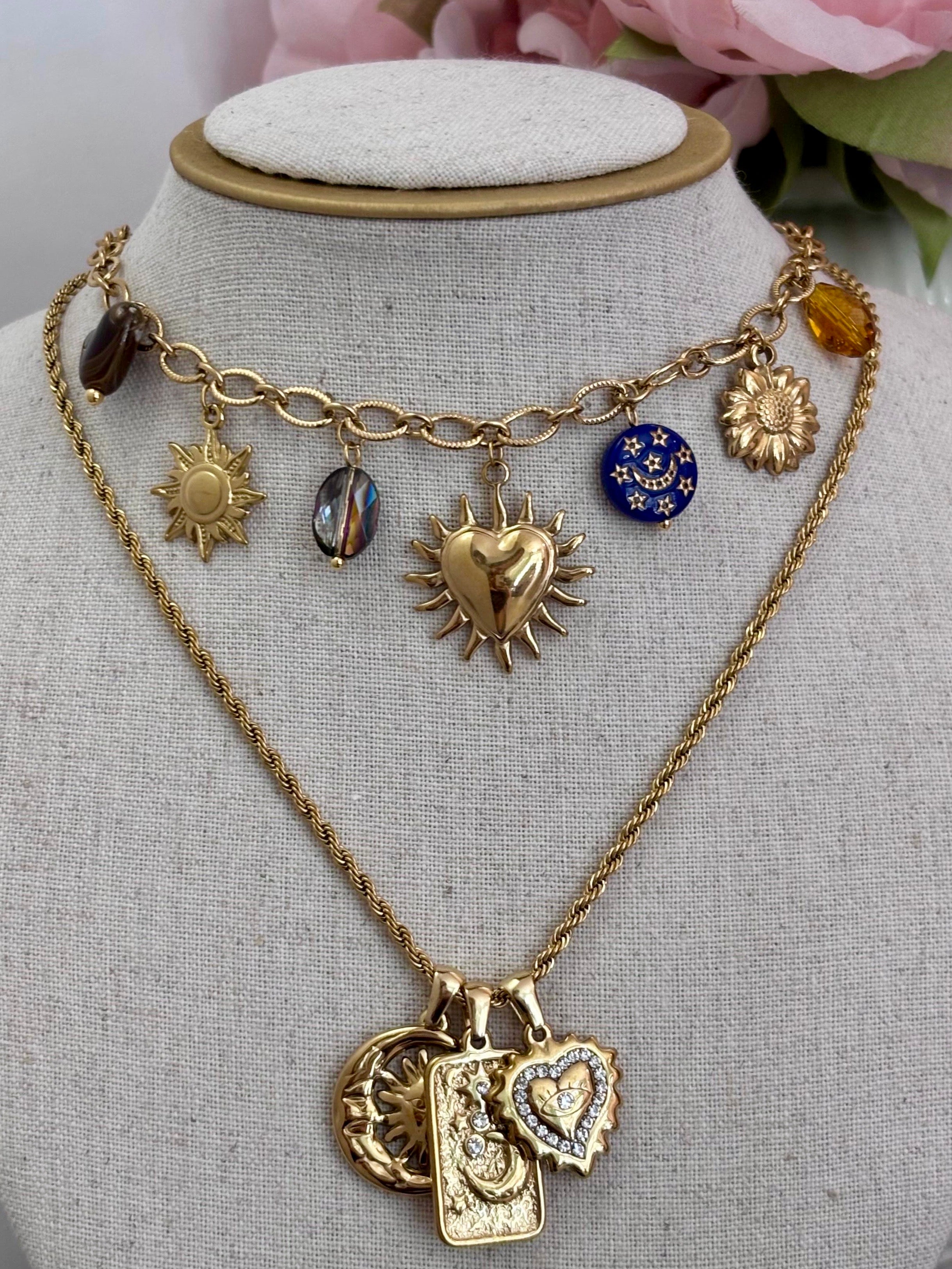 Collana multi charm cuore sacro