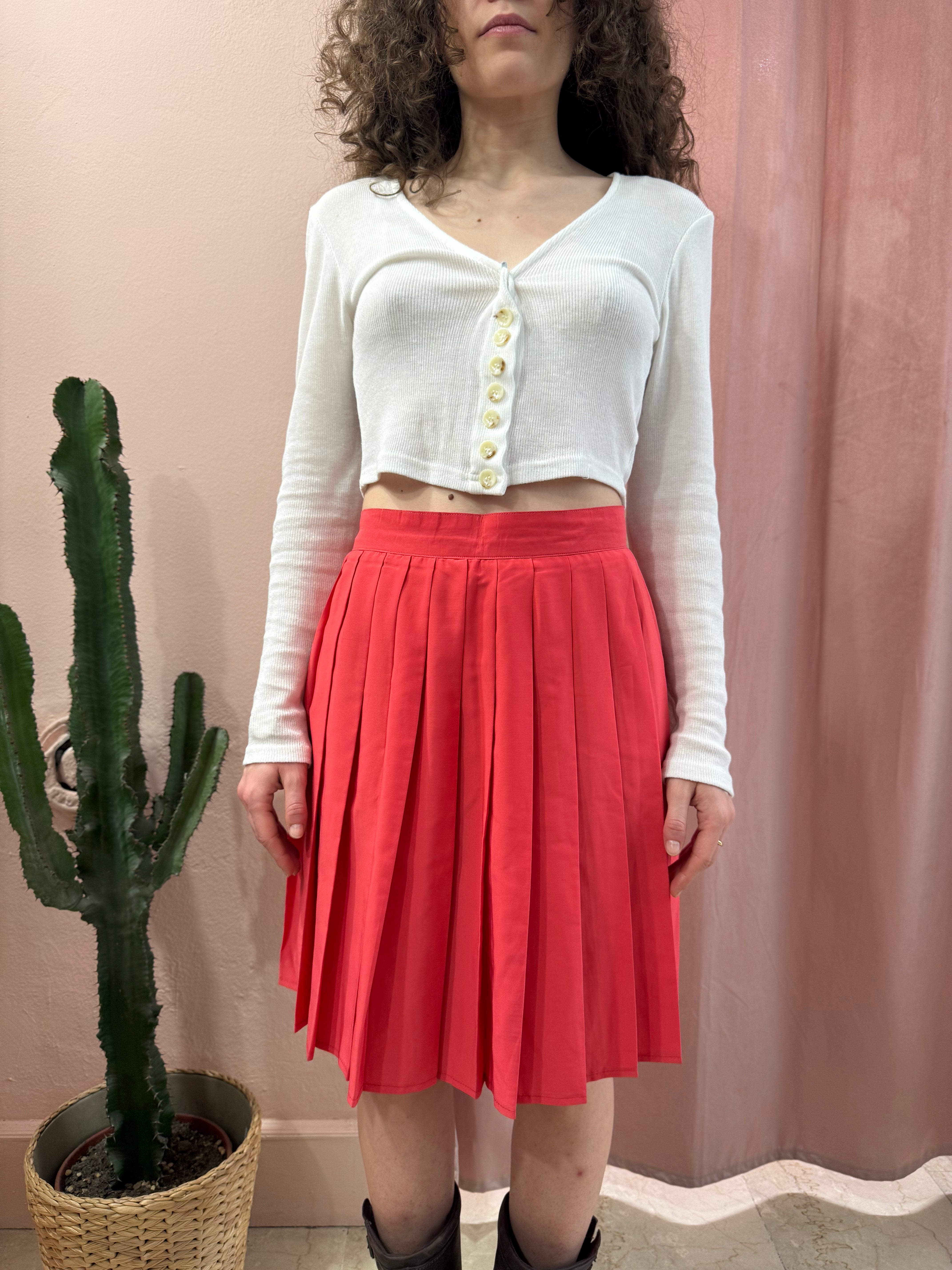 Gonna vintage con pieghe corallo