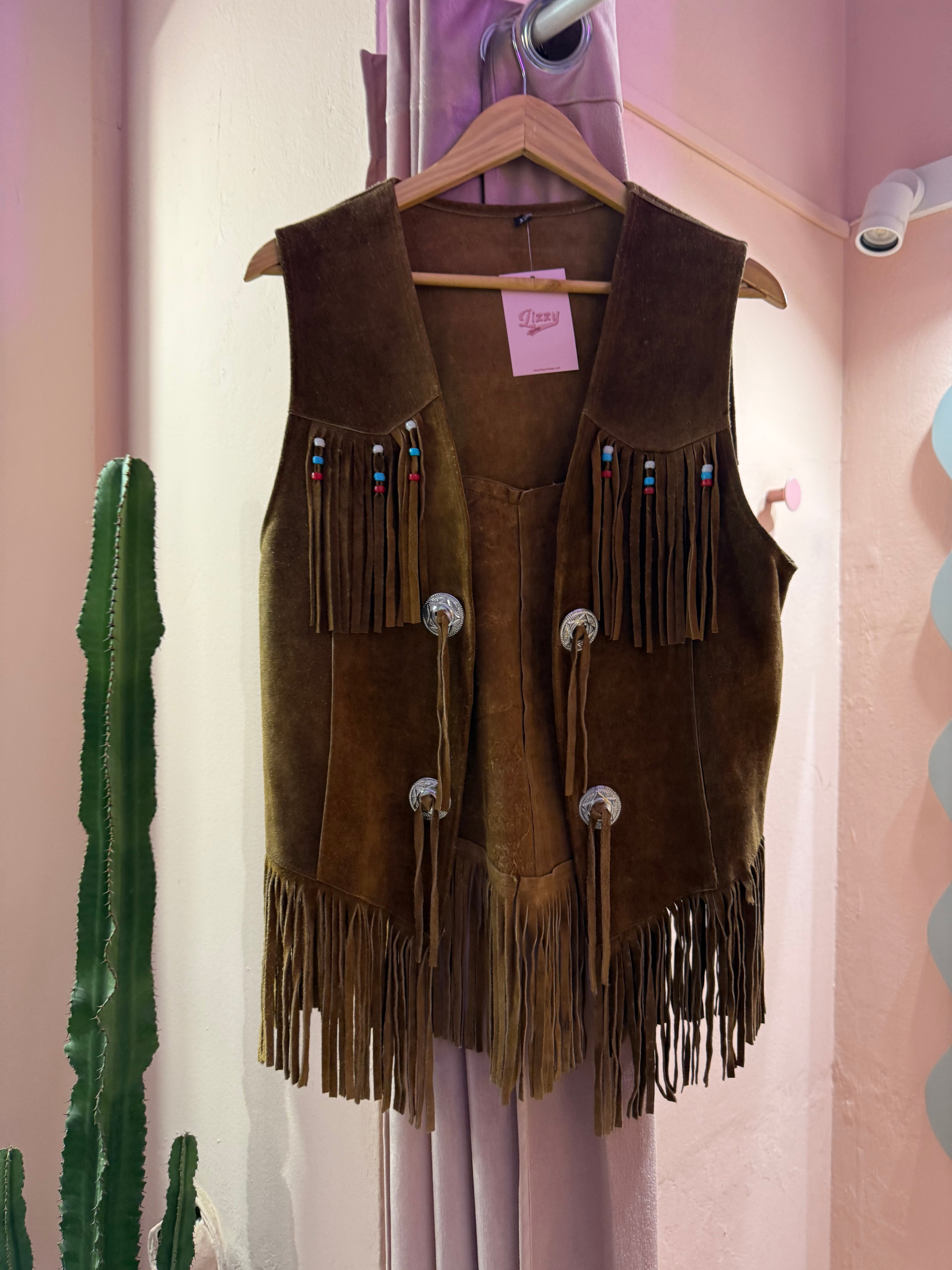 Gilet con frange in vera pelle