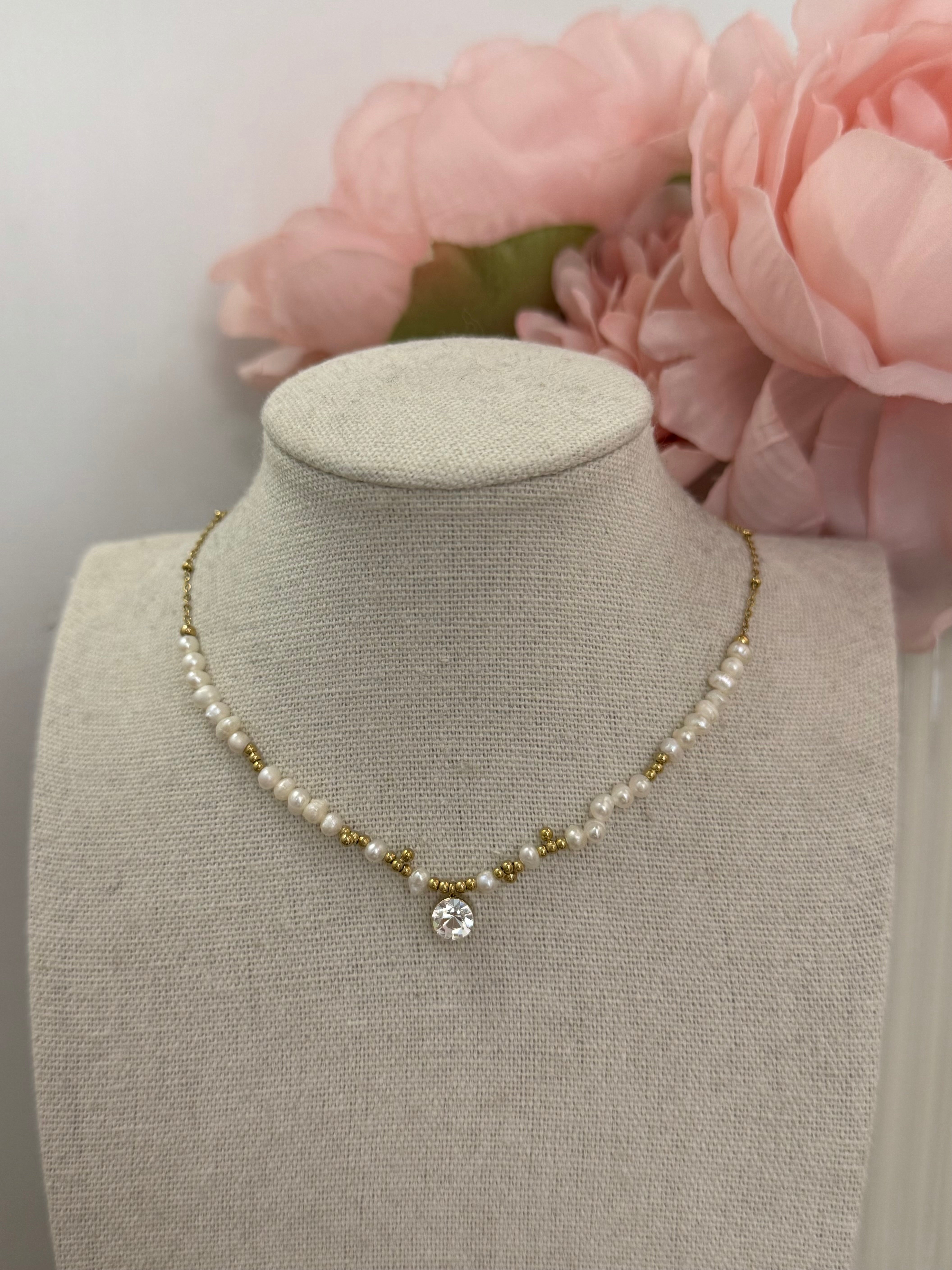 Collana con perle punto luce