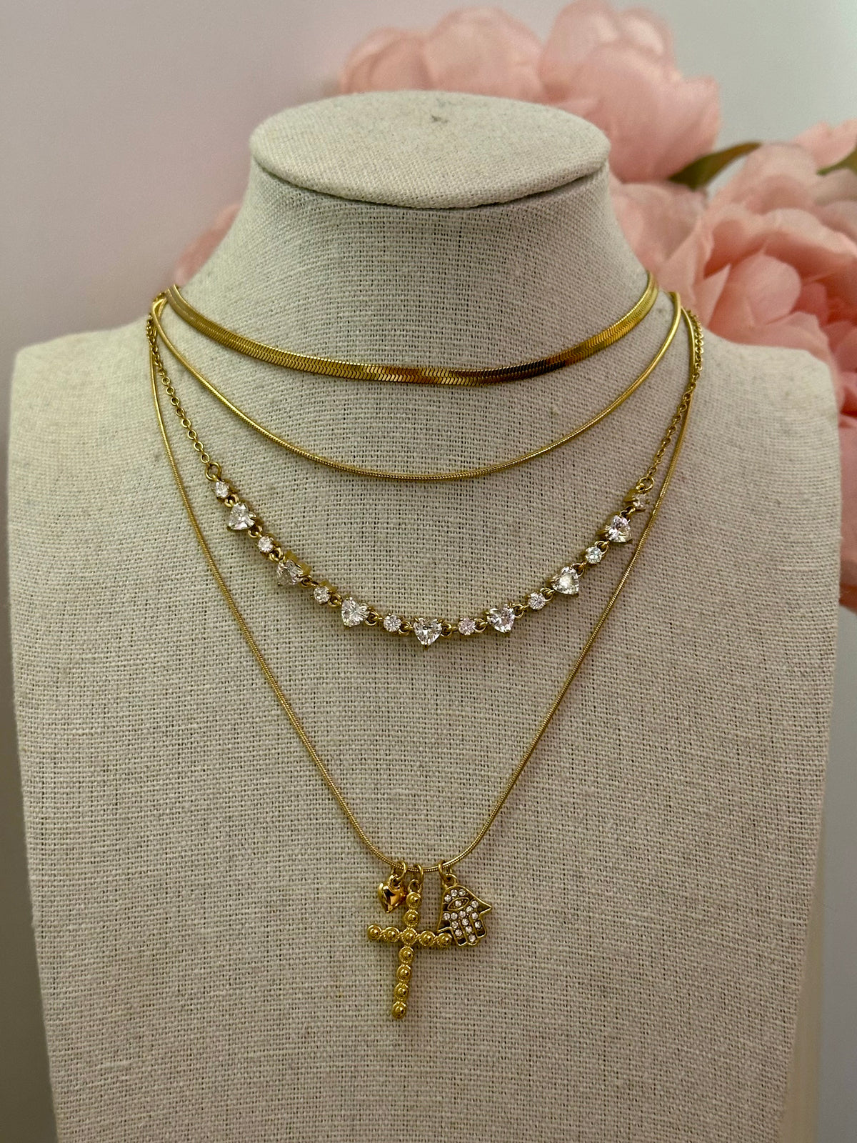 collana multicharm croce e mano di fatima