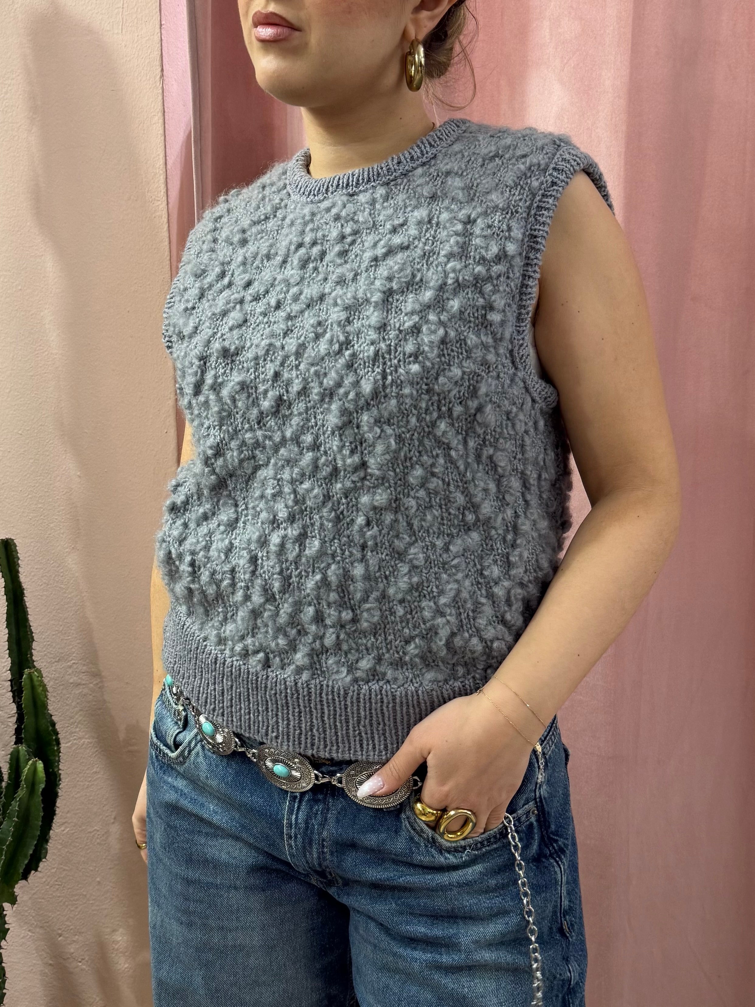 Smanicato in maglia di lana grigio