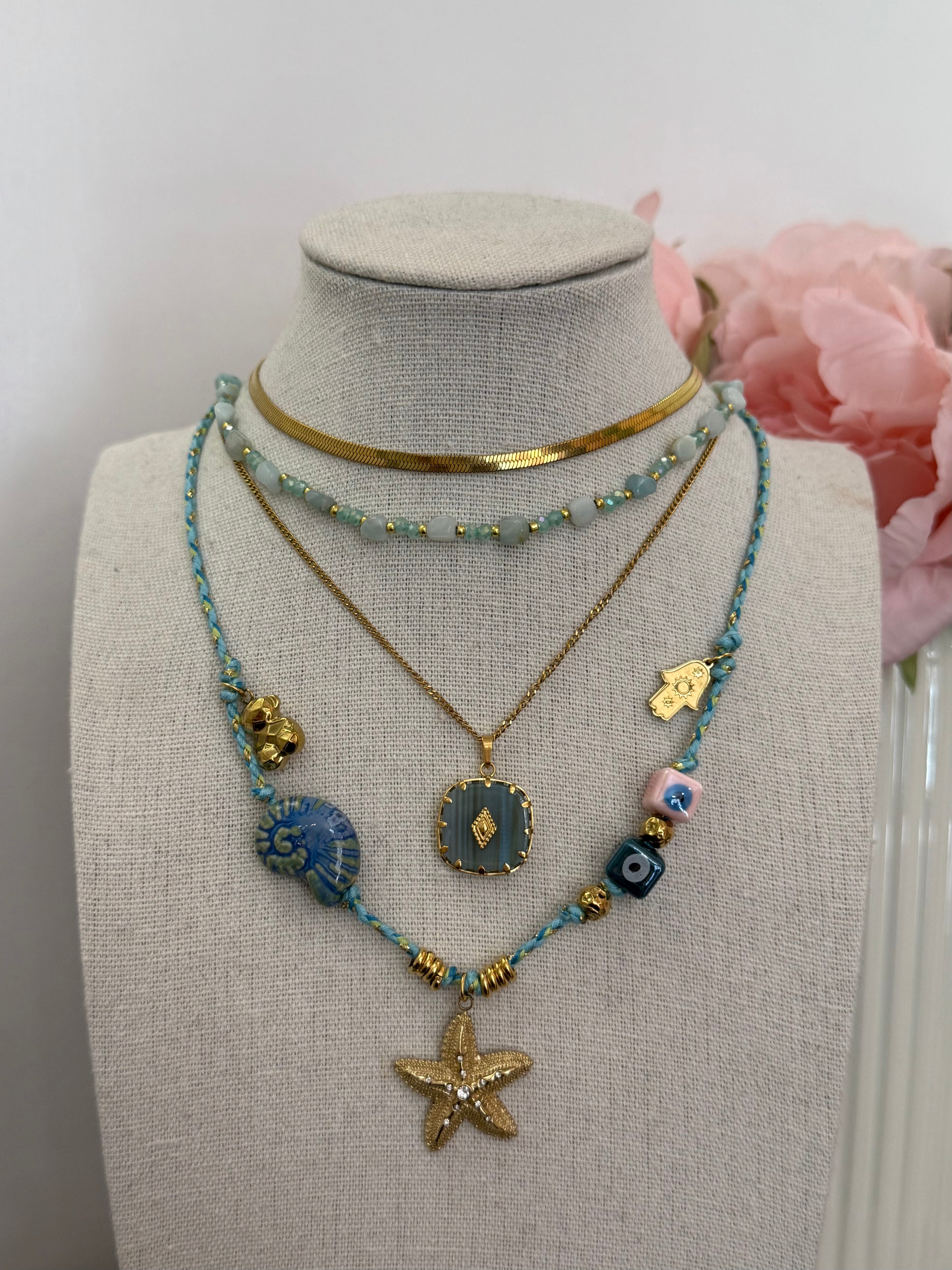 Collana multi charm stella marina corda azzurra