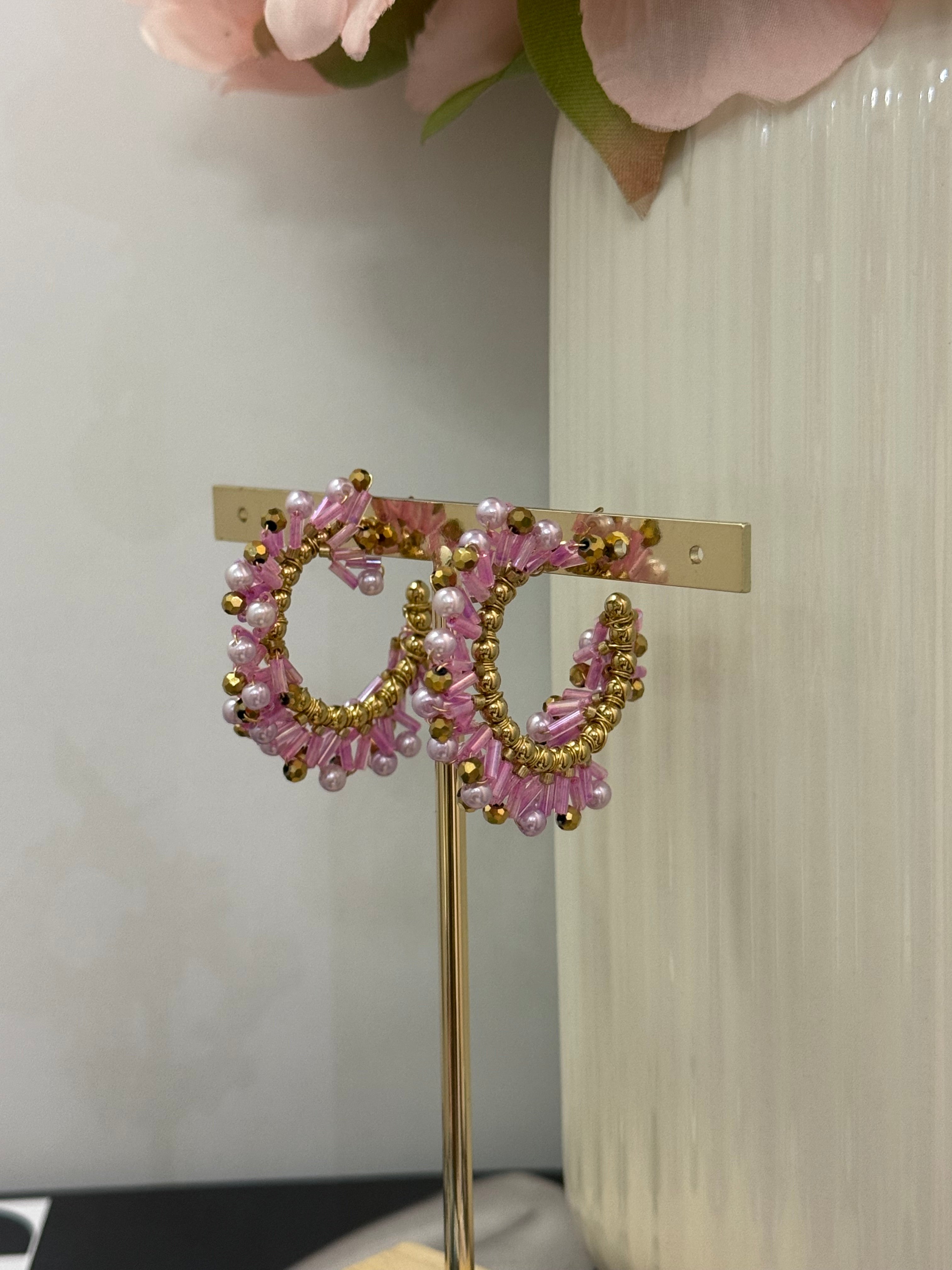 Orecchini intreccio di perline lilla | solo online