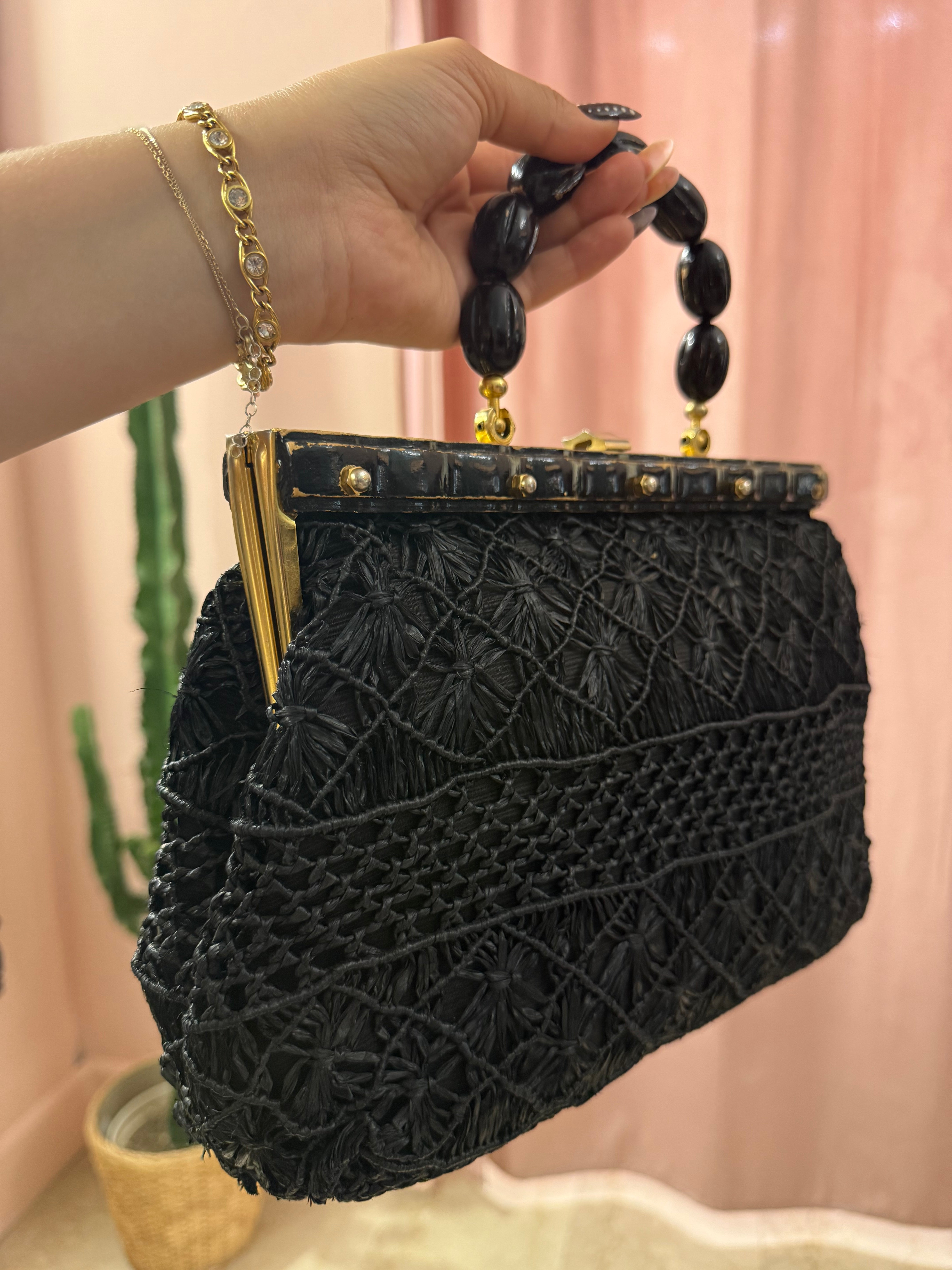 Borsa vintage in paglia con manico in legno