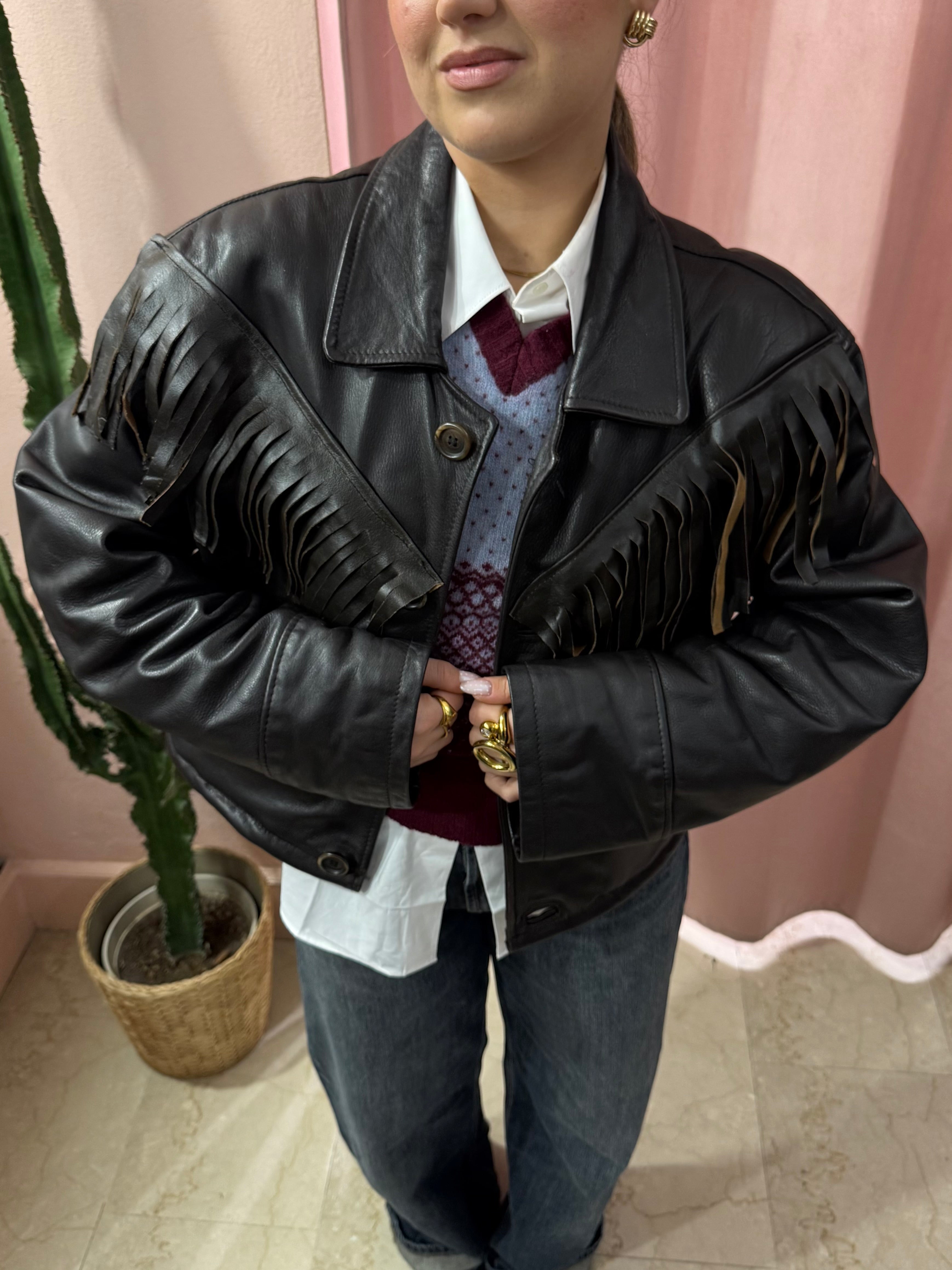 Giacca in pelle nera con frange