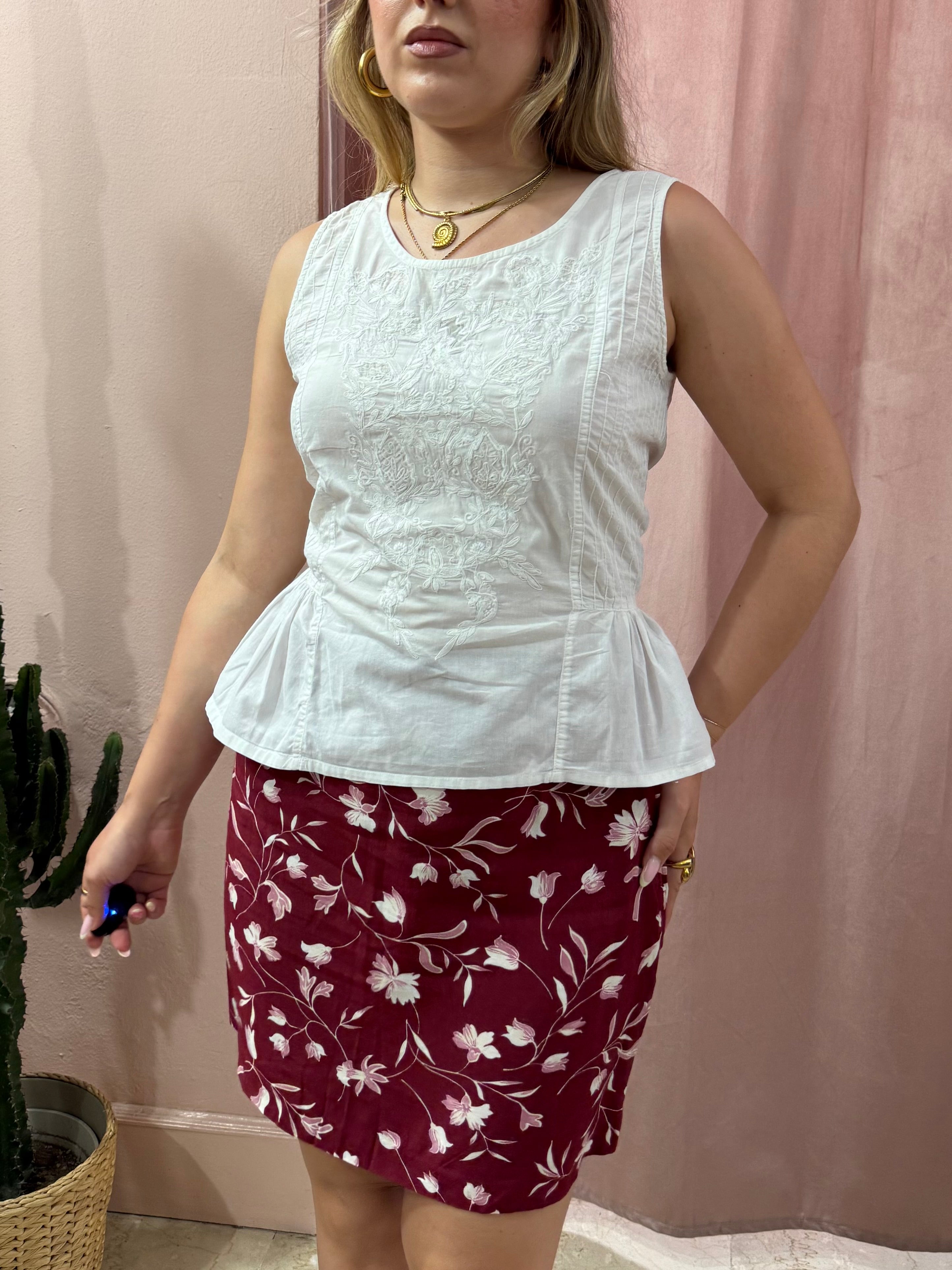 Blusa smanicata bianca in cotone con fiocco