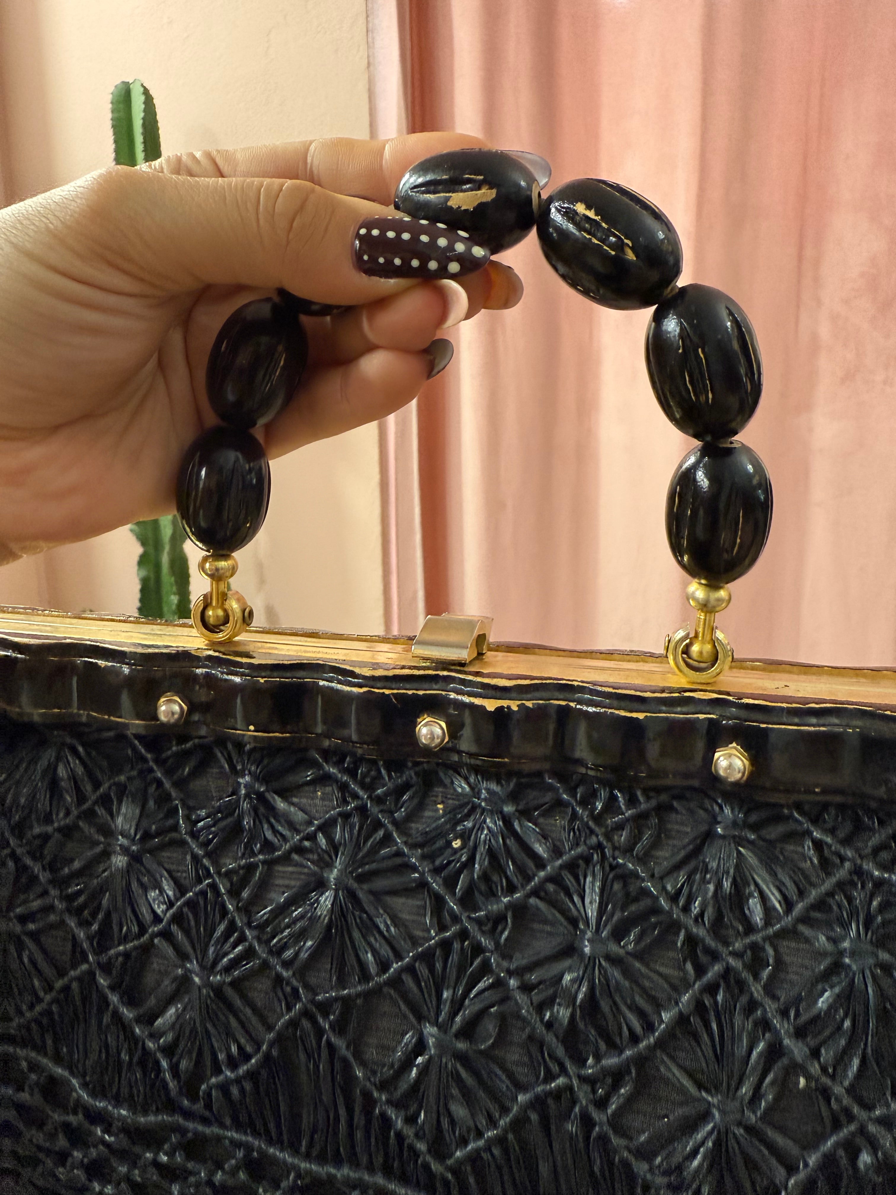 Borsa vintage in paglia con manico in legno