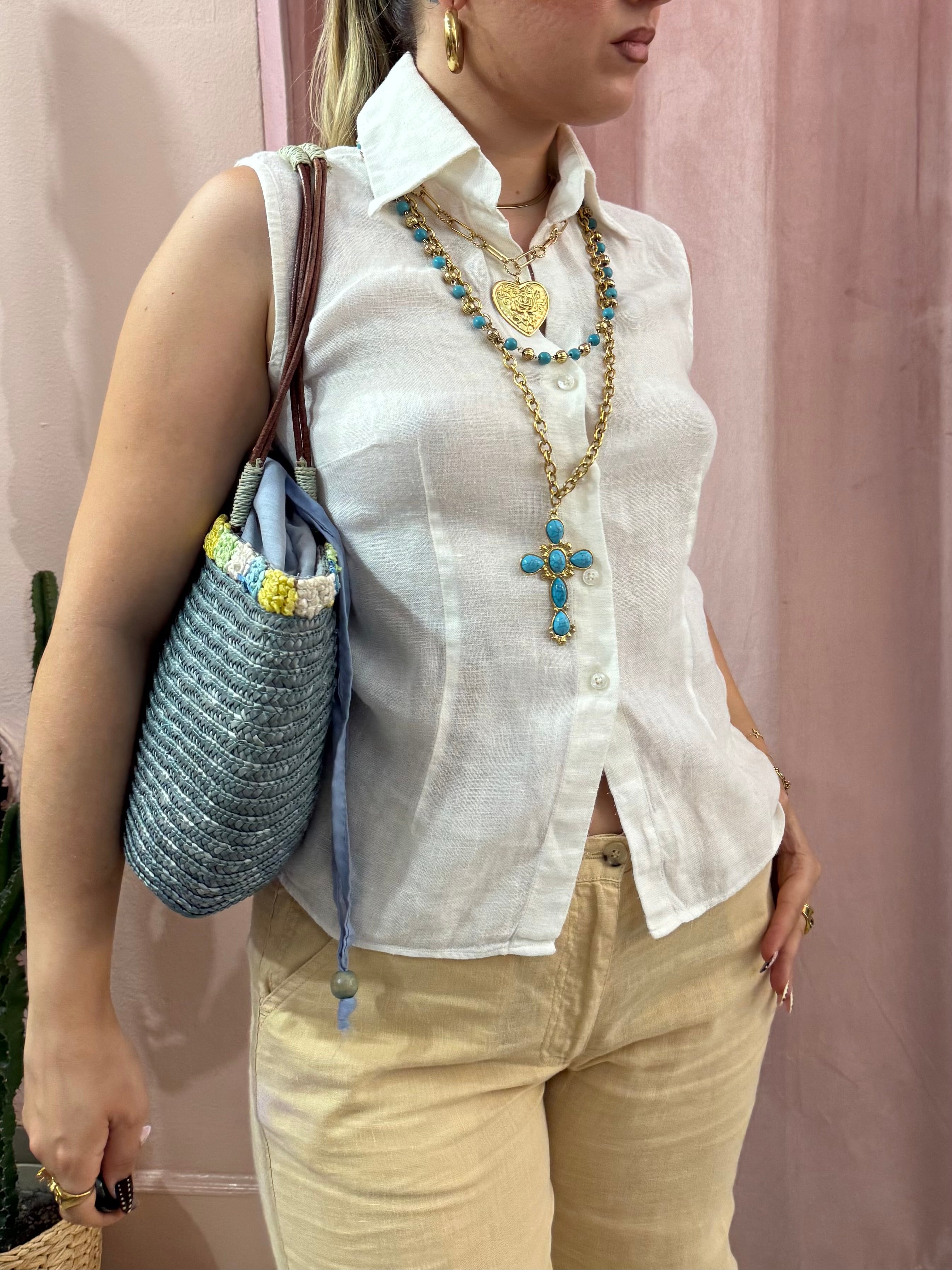 Blusa smanicata bianca in puro lino
