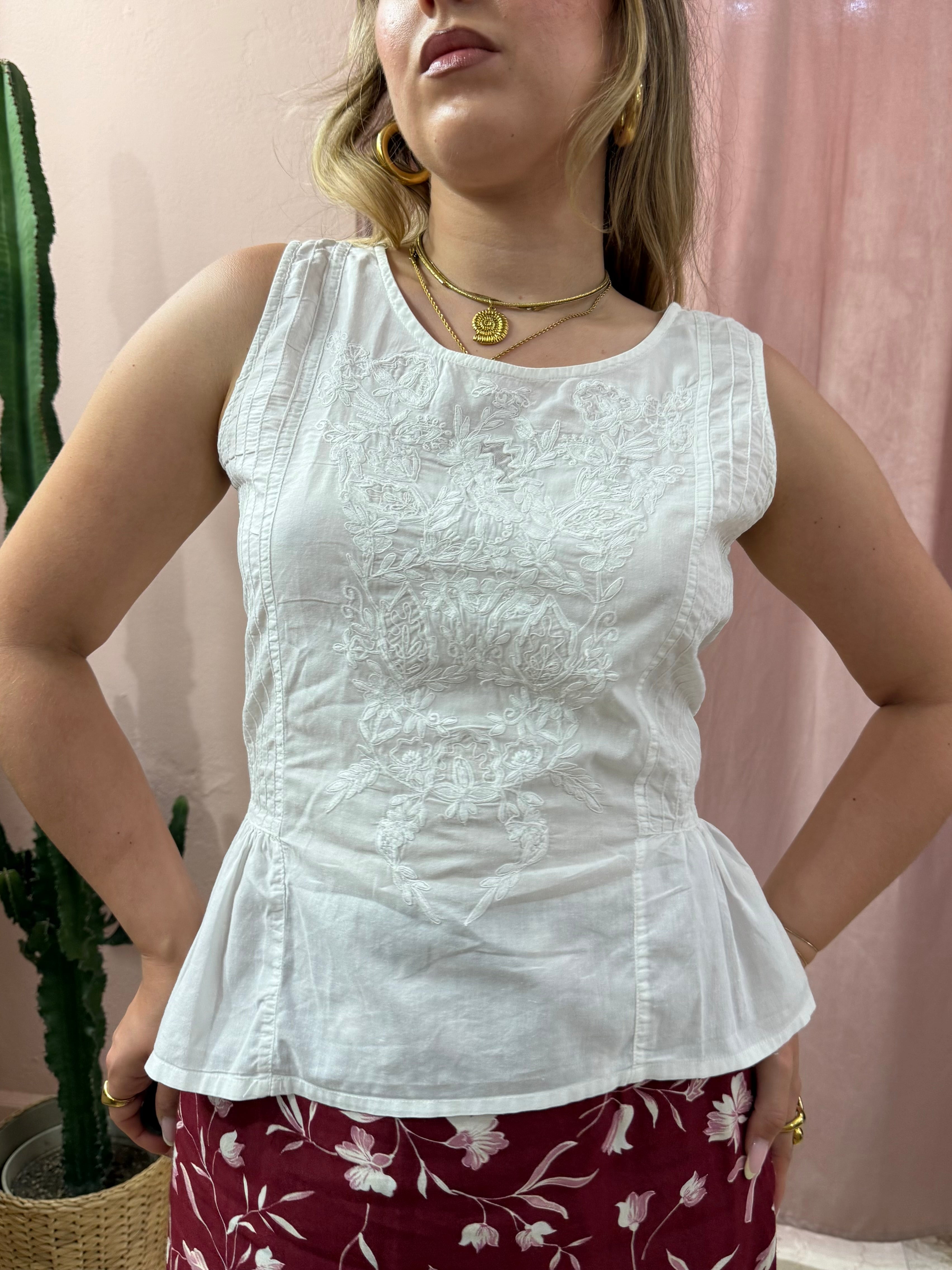 Blusa smanicata bianca in cotone con fiocco