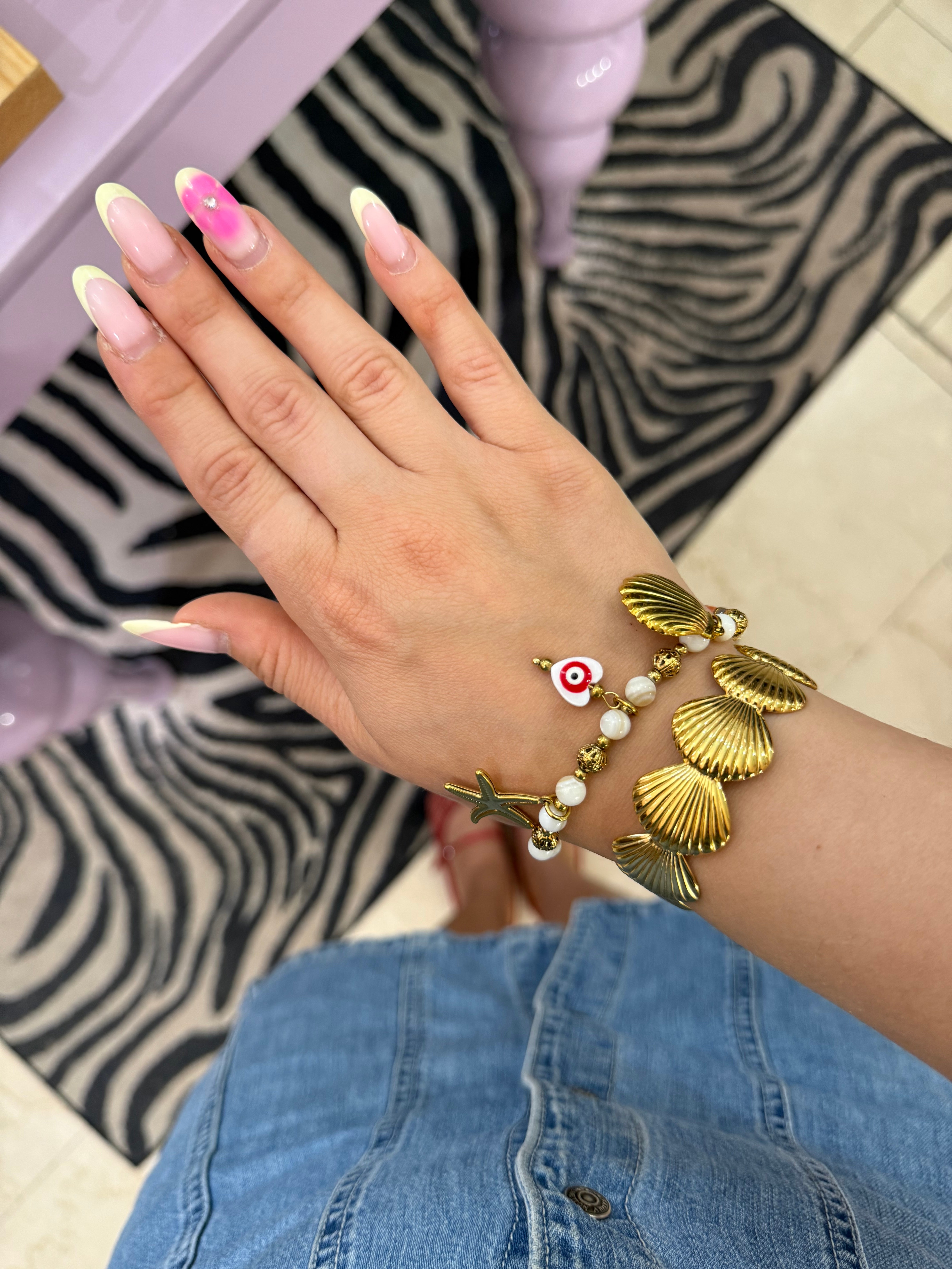 Bracciale multicharm ciondoli marini