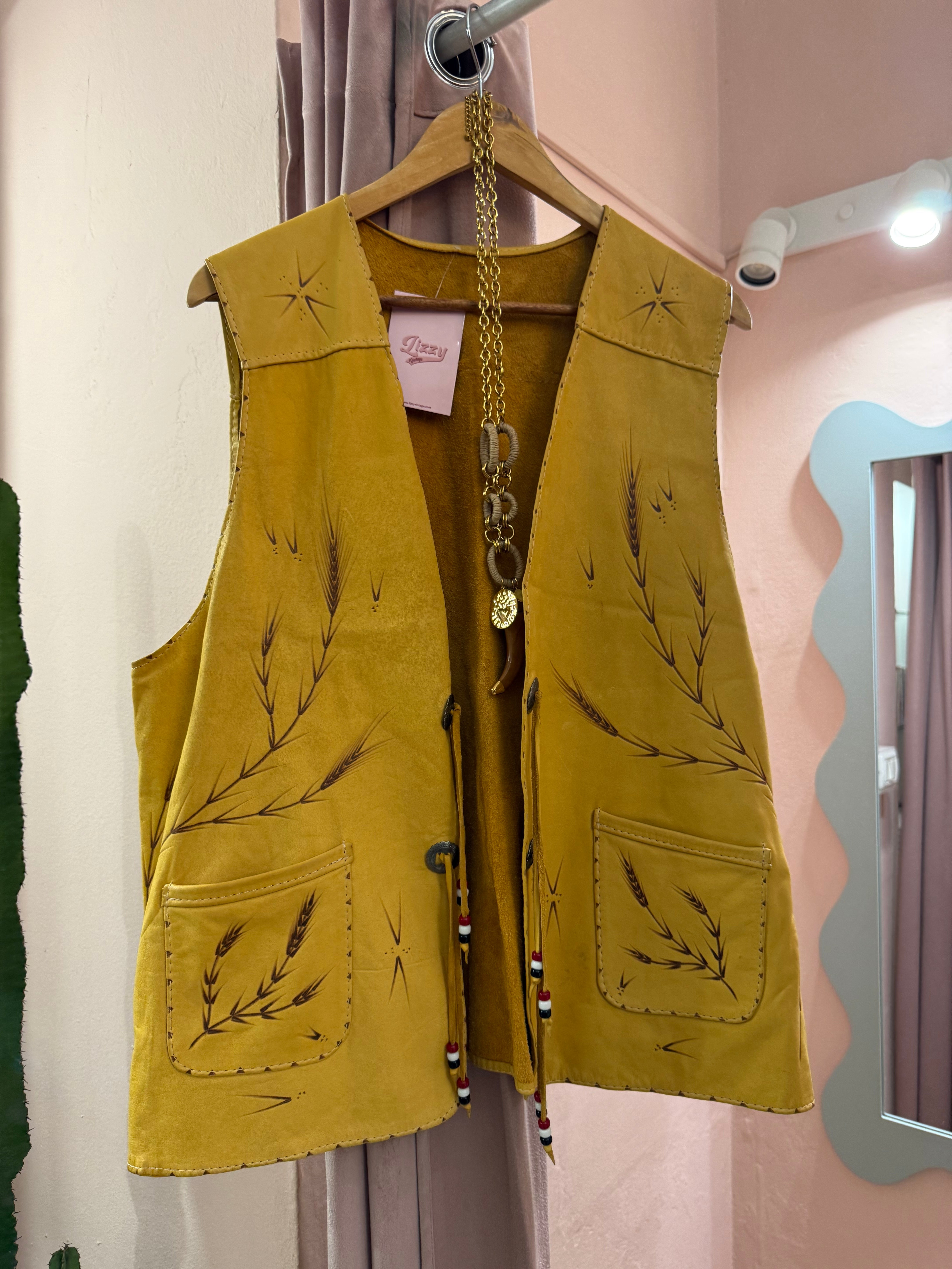 Gilet in vera pelle con fantasia spighe di grano