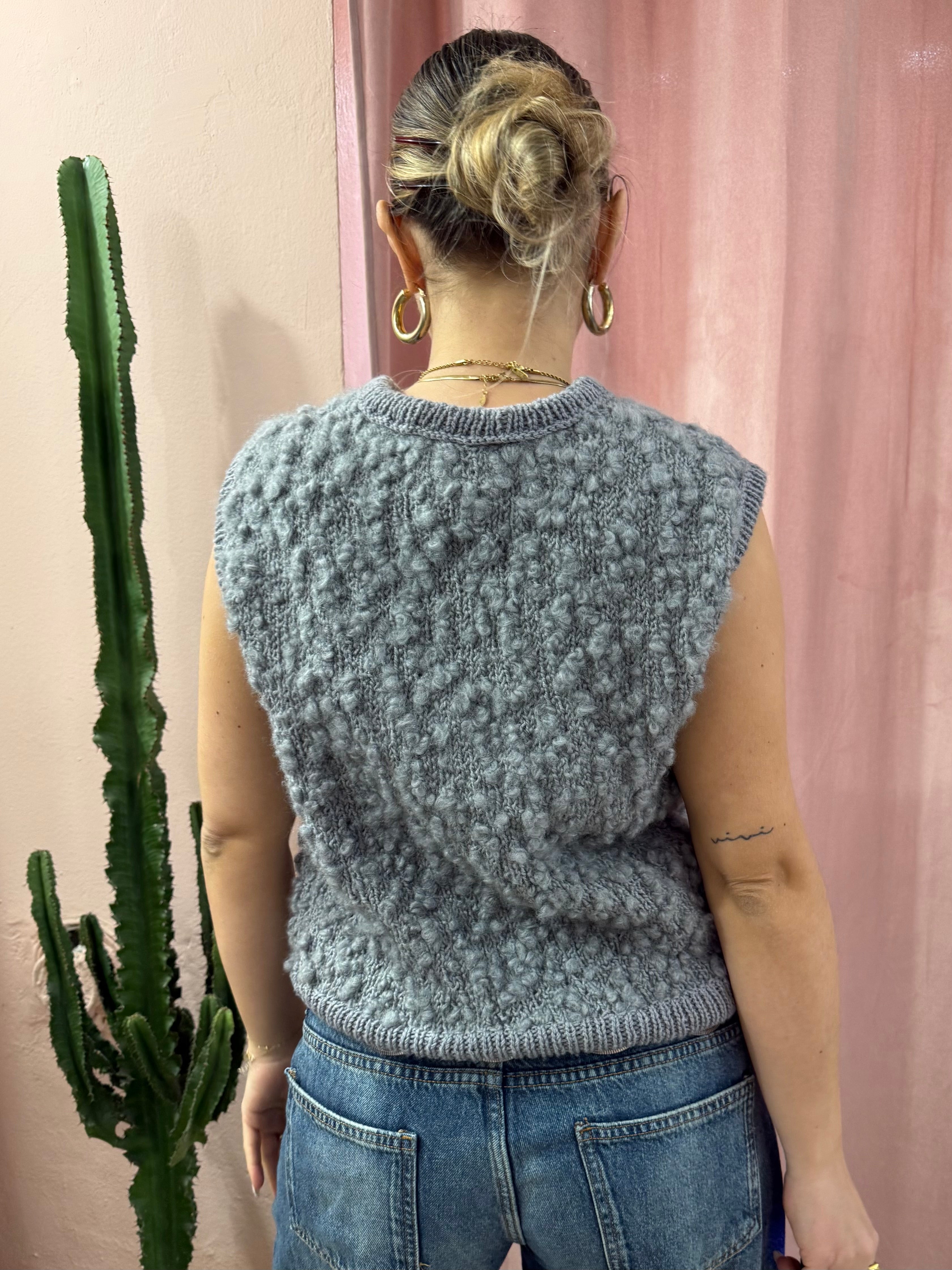 Smanicato in maglia di lana grigio