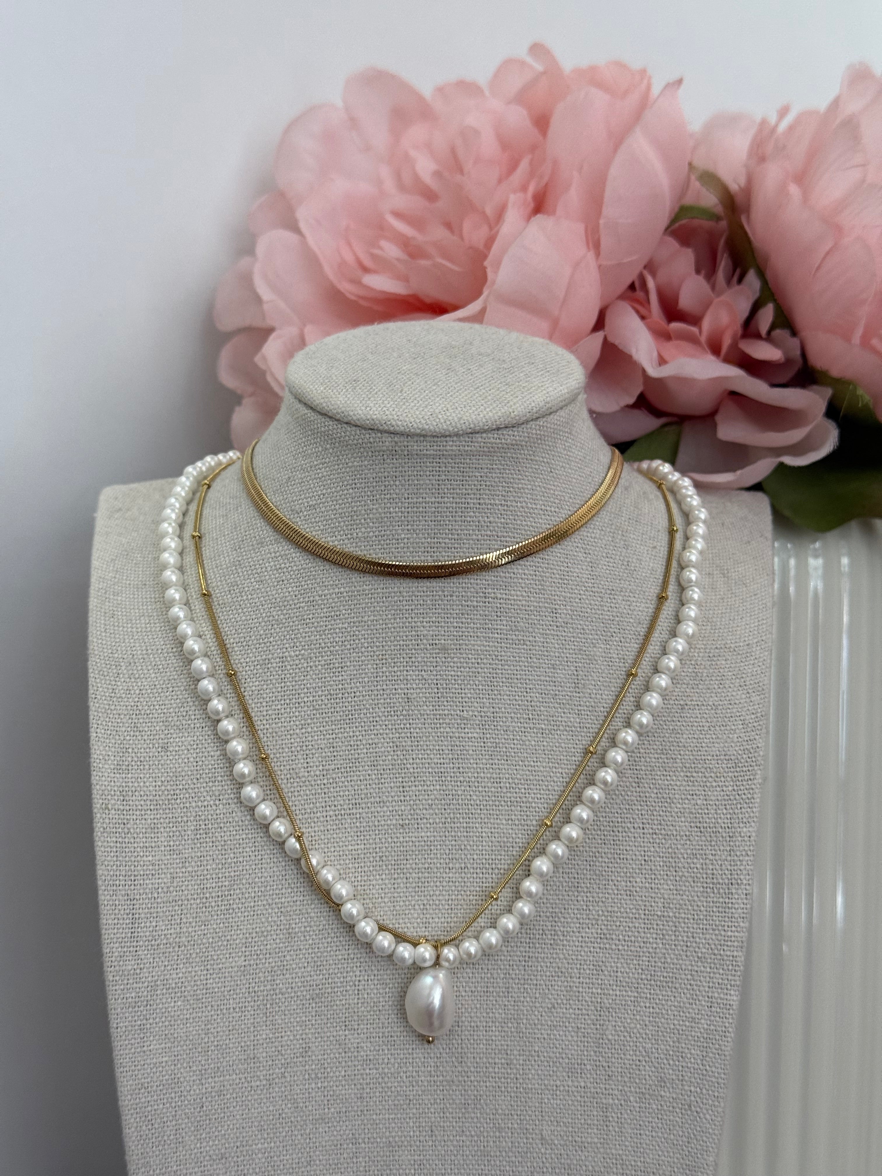 Collana doppia con perla sfaccettata