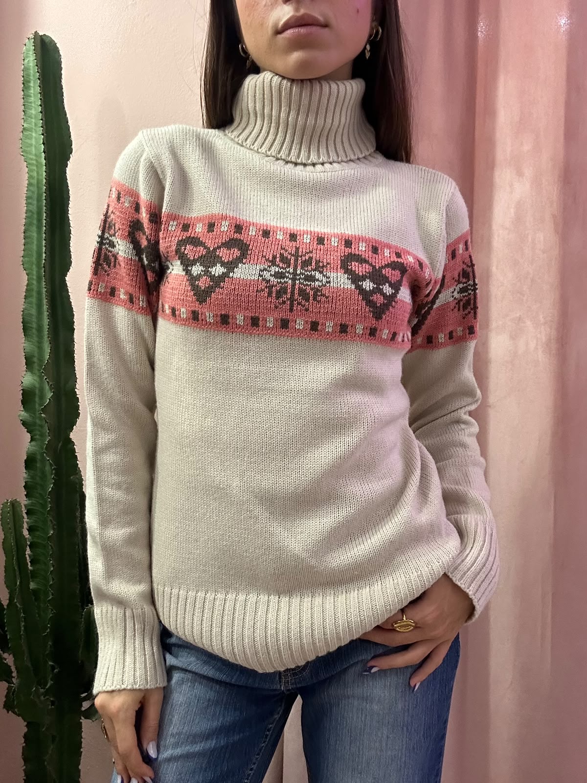 Maglione dolcevita norvegese con dettaglio rosa